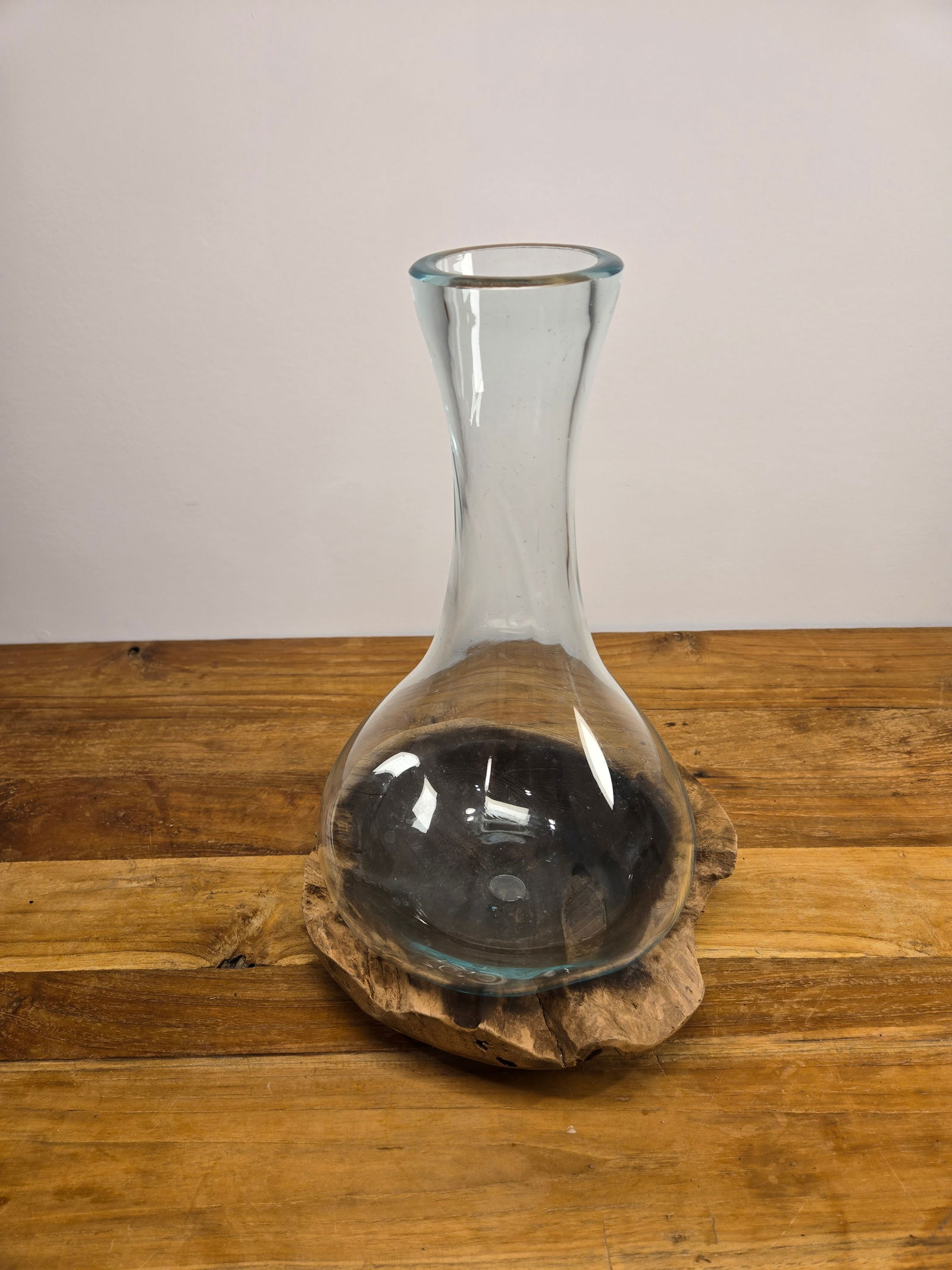 Teak Bowl with Blown Glass Vase: Teak Bowl with Blown Glass VaseThis unique vase was hand-blown in Bali, Indonesia. The vase is specific to the bowl that it was shaped into, and no two are alike.This piece is brand new.Approximate