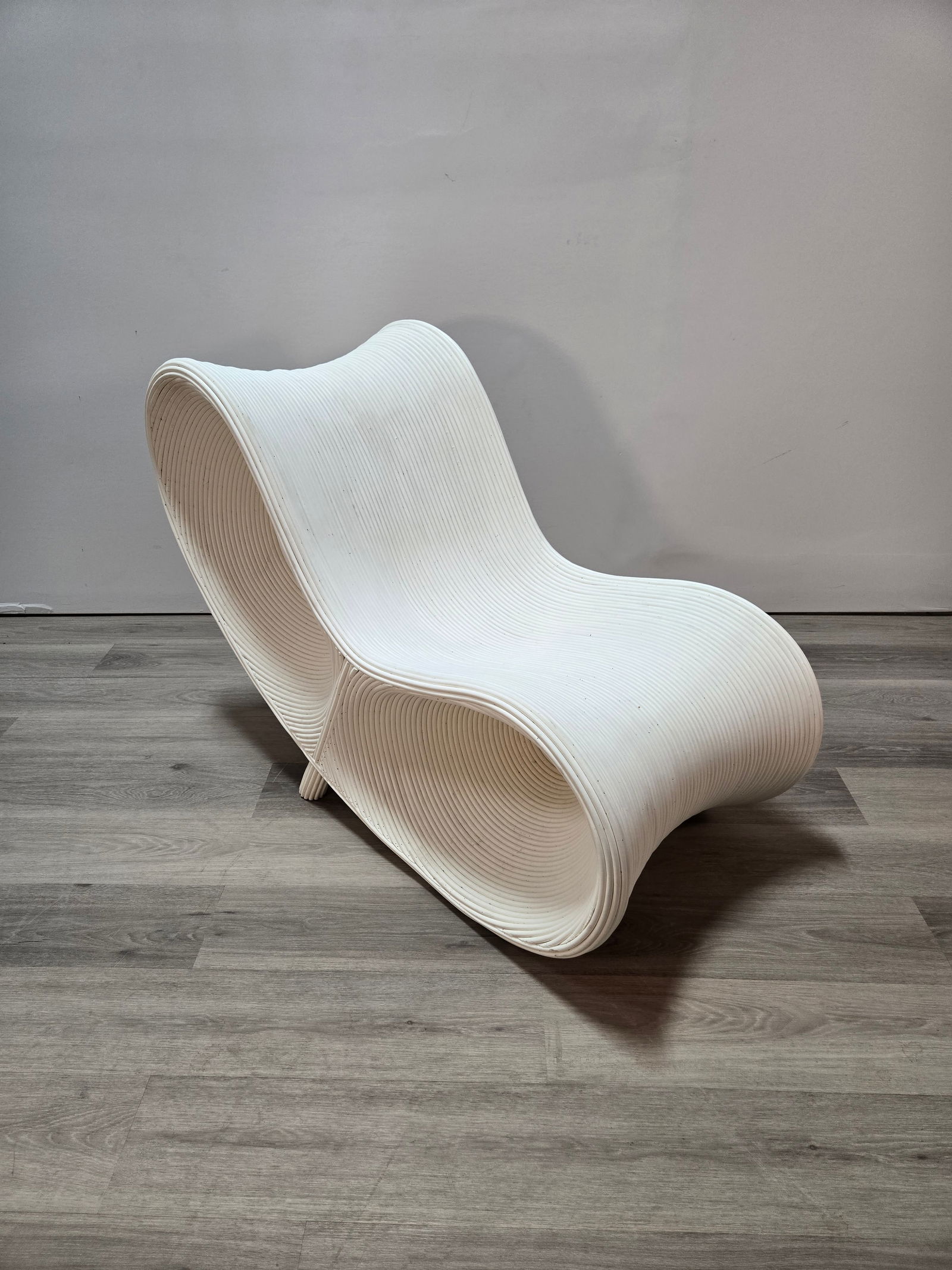 Synthetic Rattan Infinity Chair: Synthetic Rattan Infinity ChairHandmade in Java, Indonesia.Beautiful design, crafted from polyproplene for outdoor use.Chair is brand new, but has a few very light markings as shown in the