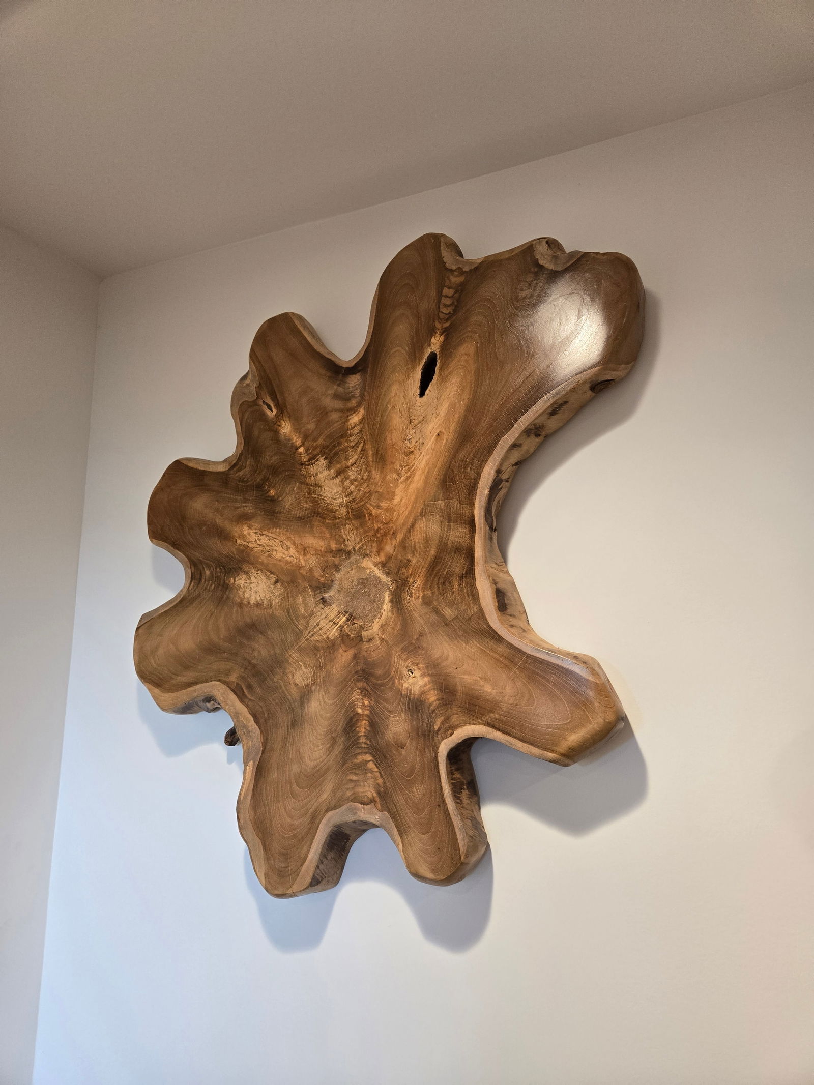 Teak Wall Art: Organic Teak Wall ArtThis unique wall art piece was hand-crafted from 100% natural, sustainably harvested teak wood.Piece is brand new.Approximate Dimensions - Height: 32"Width: 27"Depth: 2.25"* Piece