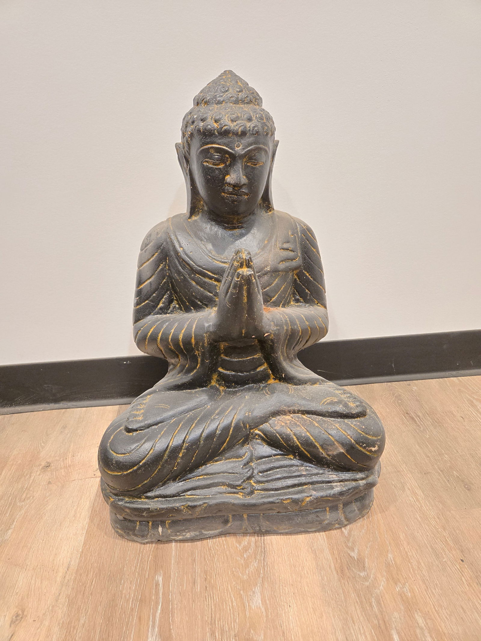 Casted Lava Stone Buddha: Casted Lava Stone BuddhaThese unique statues are created using the stone remains from hand-carved lava stone statues. Once the solid lava stone statues are carved, the leftover pieces of lava stone ar