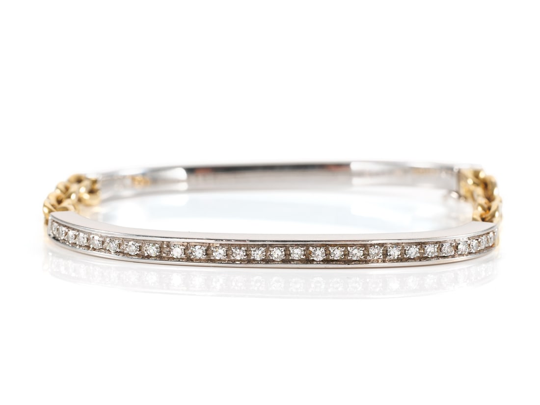 Exquisite bracelet, 18k yellow/white gold with diamonds: Exquisite bracelet, 18k yellow/white gold with diamondsExquisite bracelet in yellow and white gold, hallmarked 750 on the clasp. Set in the bracelet are 27 eight-cut diamonds, totaling 0.50 carats acc
