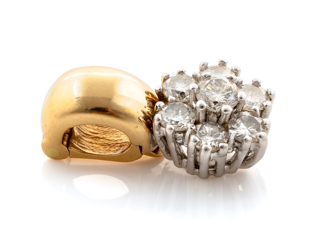 Elegant pendant in gold 585 yellow/white with diamonds: Elegant pendant in gold 585 yellow/white with diamonds Pendant in gold in the colours yellow and white, hallmarked 585 in the eyelet (for opening). The pendant is set with 7 brilliant-cut diamonds (lo
