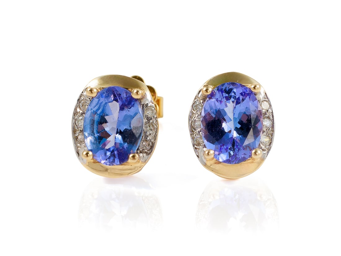 Tanzanite and diamond stud earrings, 14k yellow gold (585), with 18k yellow gold backs: Tanzanite and diamond stud earrings, 14k yellow gold (585), with 18k yellow gold backsYellow gold stud earrings, hallmarked IV585 on the posts, the backs hallmarked 750. Each earring features a tanzan