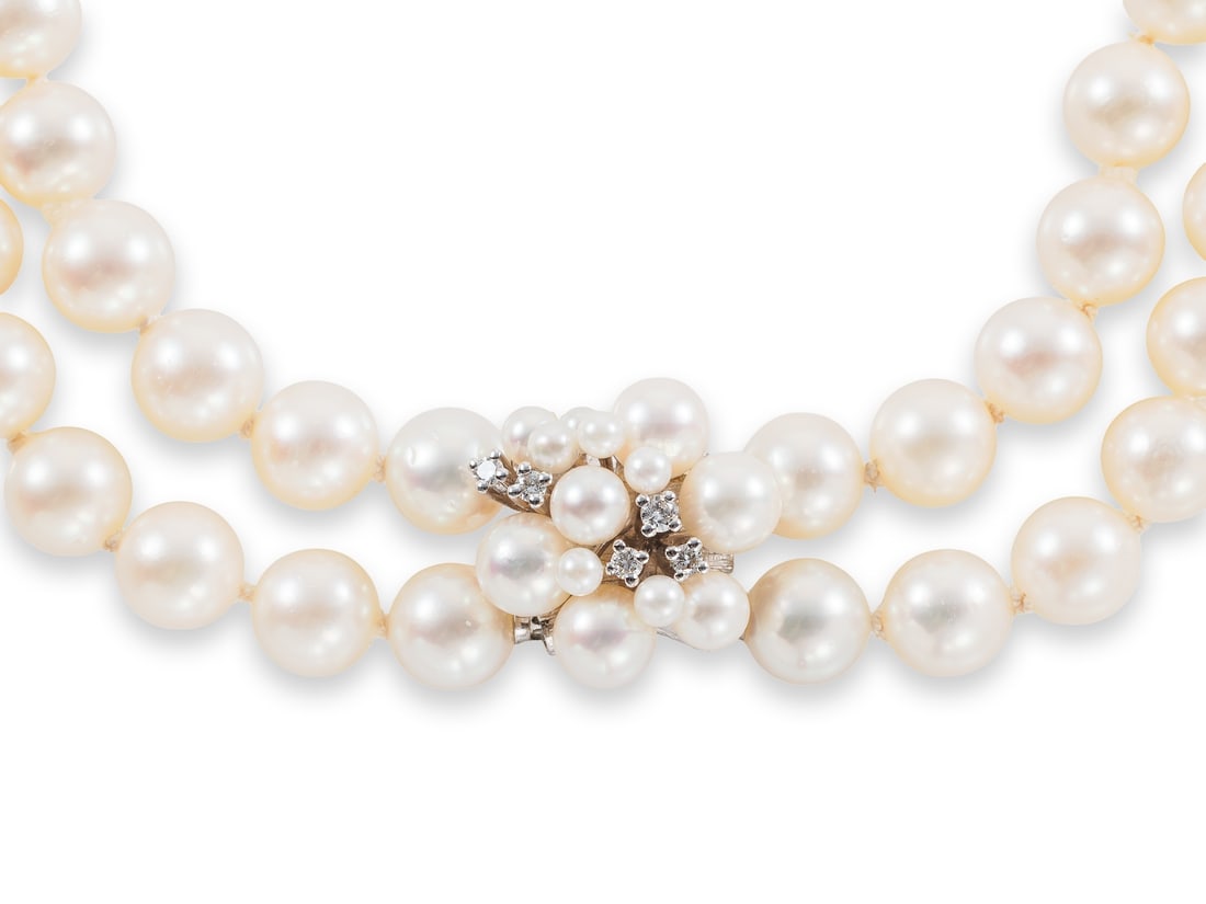 Exquisite, double-strand, long Akoya cultured pearl necklace with a white gold and diamond clasp. (1 of 6)