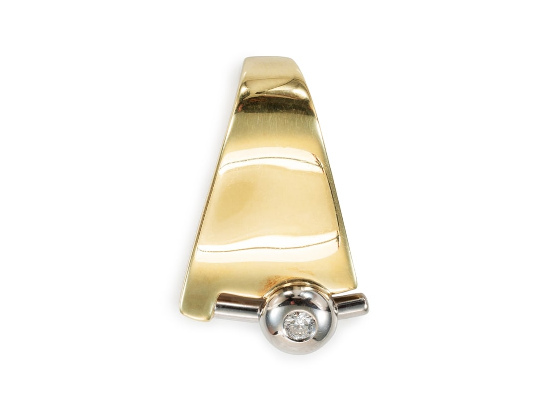 Brilliant pendant in 585 yellow gold and white gold: Brilliant pendant in 585 yellow gold and white goldPendant in yellow gold and white gold, hallmarked 585. Set in the pendant is a brilliant (medium colour and clarity) weighing 0.07 carats according t