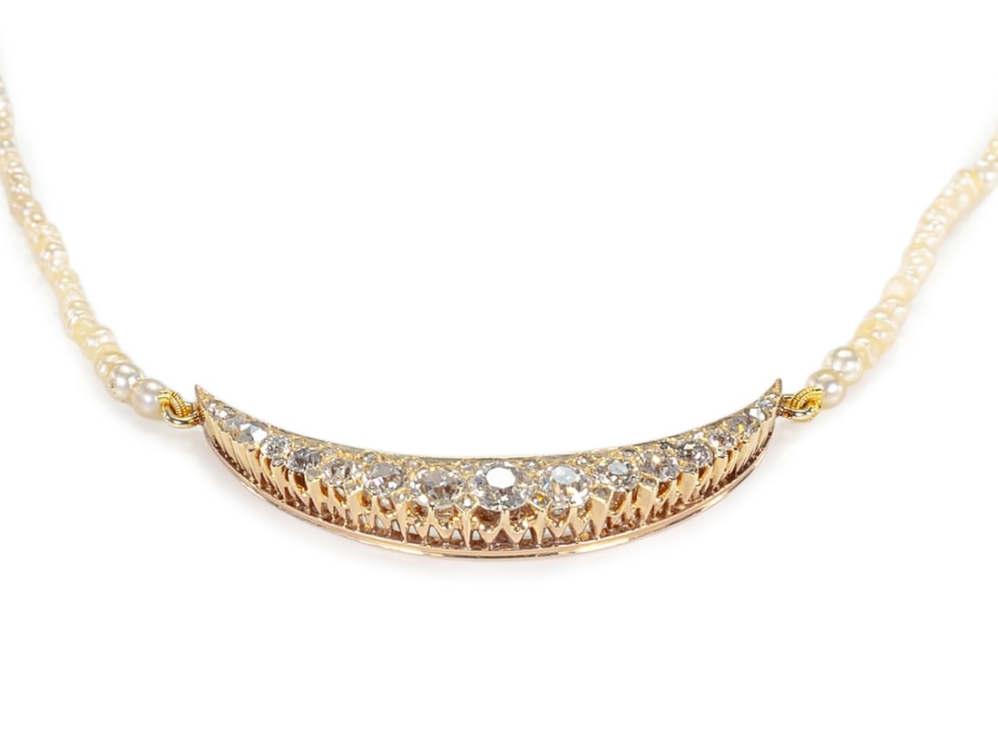 Antique Natural Pearl Necklace with Yellow Gold, Old Cut Diamonds, and Rose-Cut Diamond: Antique Natural Pearl Necklace with Yellow Gold, Old Cut Diamonds, and Rose-Cut Diamond EmbellishmentAntique necklace of small natural pearls, 47 cm long. The centerpiece (approximately 39 x 5 mm) of