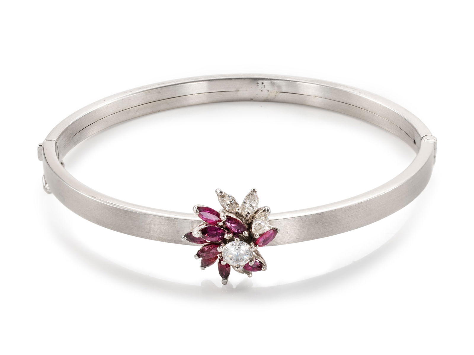 Bangle made of 585 white gold with stone setting: Bangle made of 585 white gold with stone settingMatt white gold bangle, hallmarked 585 in the clasp of the box clasp. Set on the bangle is a round zirconia with a diameter of 5.8 mm, 9 ruby navettes (