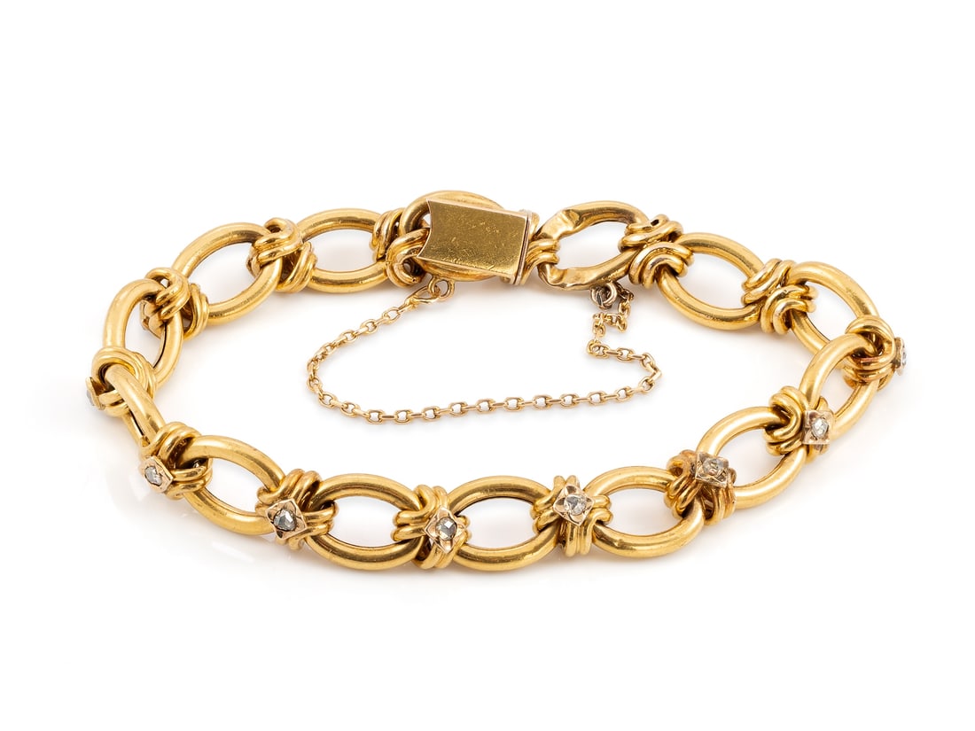 Antique bracelet, France, in 18k yellow gold with 13 rose-cut diamonds: Antique bracelet, France, in 18k yellow gold with 13 rose-cut diamondsAntique 19th-century bracelet in 18k yellow gold, three French hallmarks on the clasp of the box lock, the safety chain is in 14k