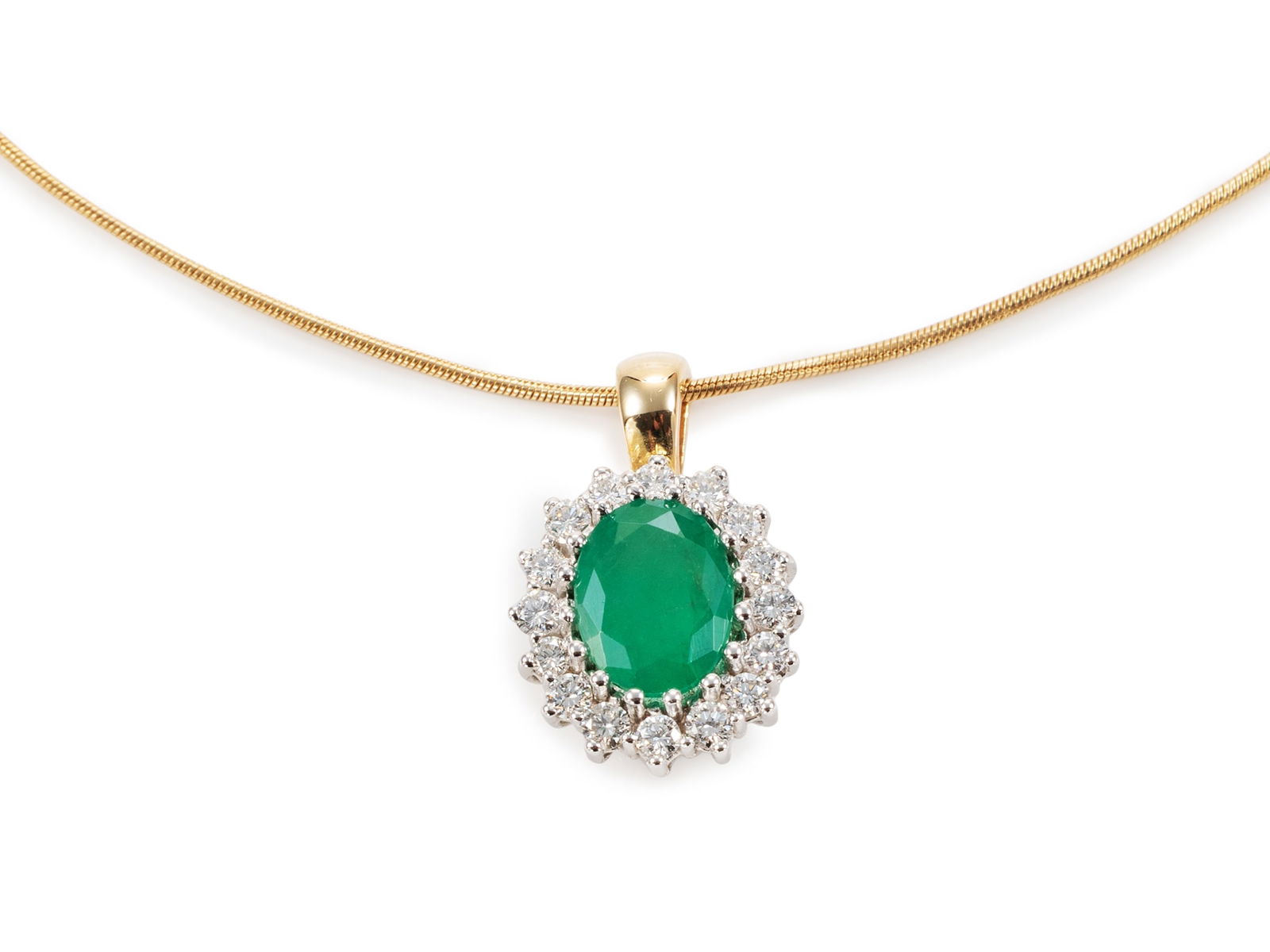 Emerald and Diamond Pendant in 14k White and Yellow Gold by Christ with Chain: Emerald and Diamond Pendant in 14k White and Yellow Gold by Christ with ChainPendant in white and yellow gold, hallmarked 585 CHRIST. Set in the pendant is an emerald (approximately 9 x 7 x 4.6 mm) of