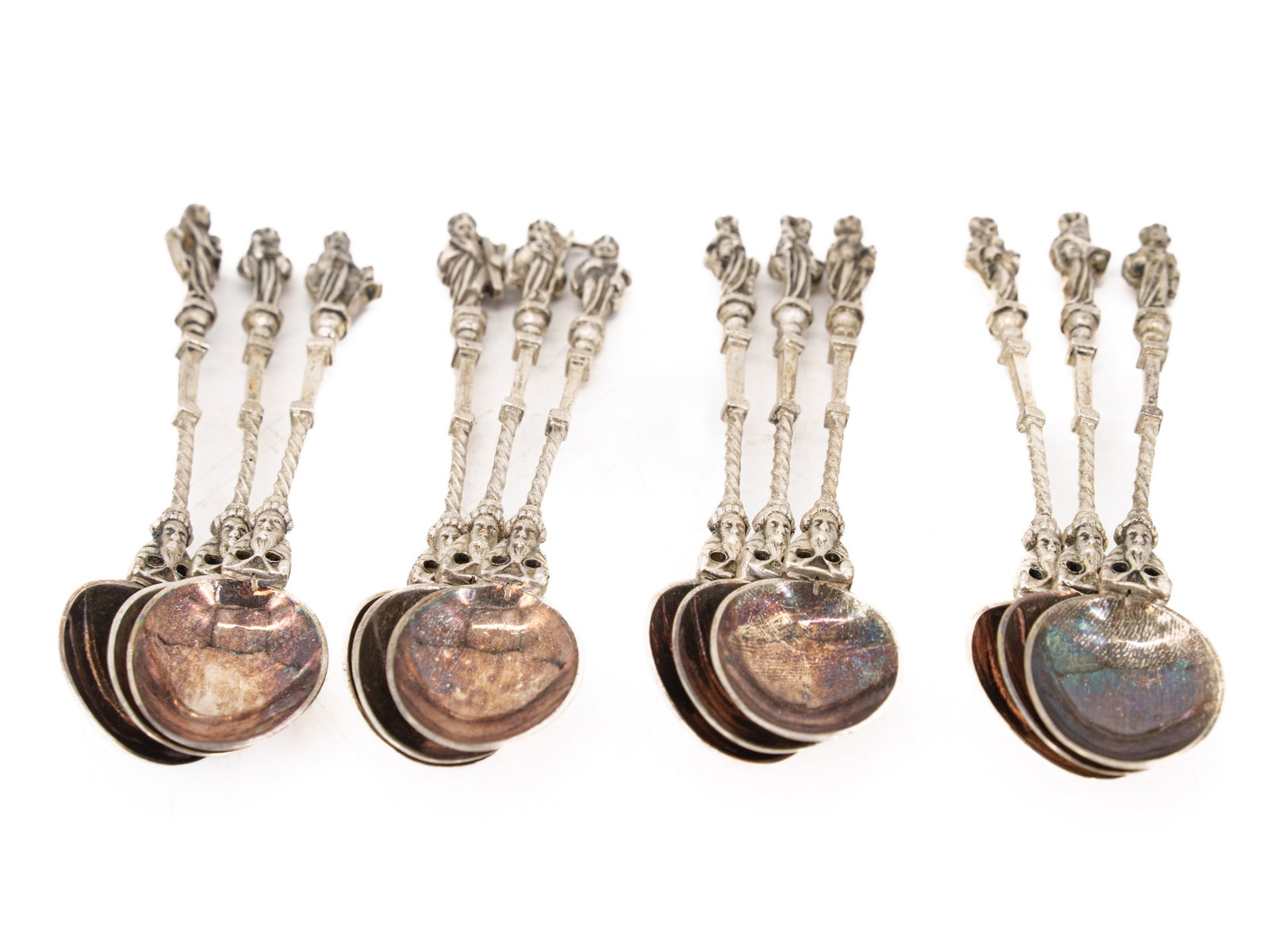 Case with 12 apostle spoons in 833 silver, Netherlands, circa 1900: Case with 12 apostle spoons in 833 silver, Netherlands, circa 1900Set consisting of 12 dessert spoons in 833 silver. The ends of the spoon handles are each decorated with a fully sculpted figure of an