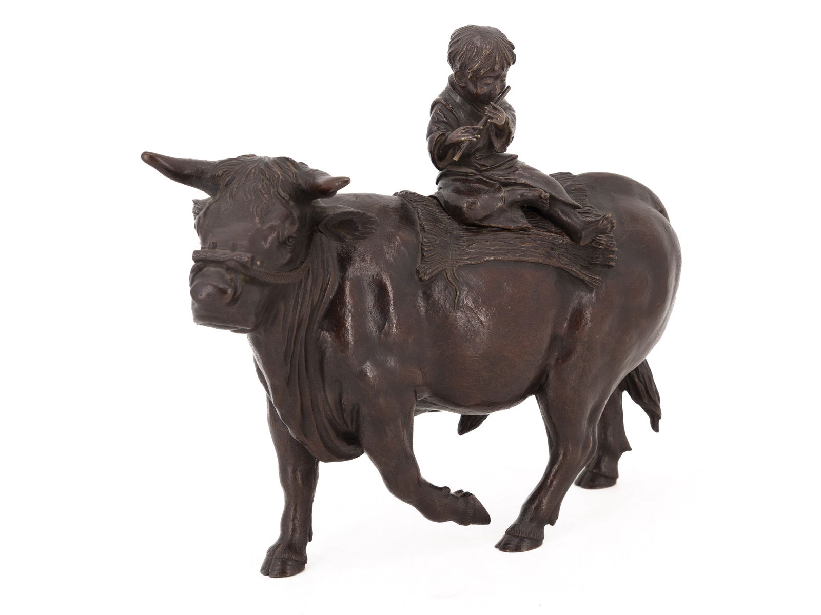 Bronze figure, "Boy on Ox," Japan, first half of the 20th century: Bronze figure, "Boy on Ox," Japan, first half of the 20th centuryDepicts a seated boy playing the flute on a striding ox. The bronze figure is cast in the round with a dark brown patina. The boy is a