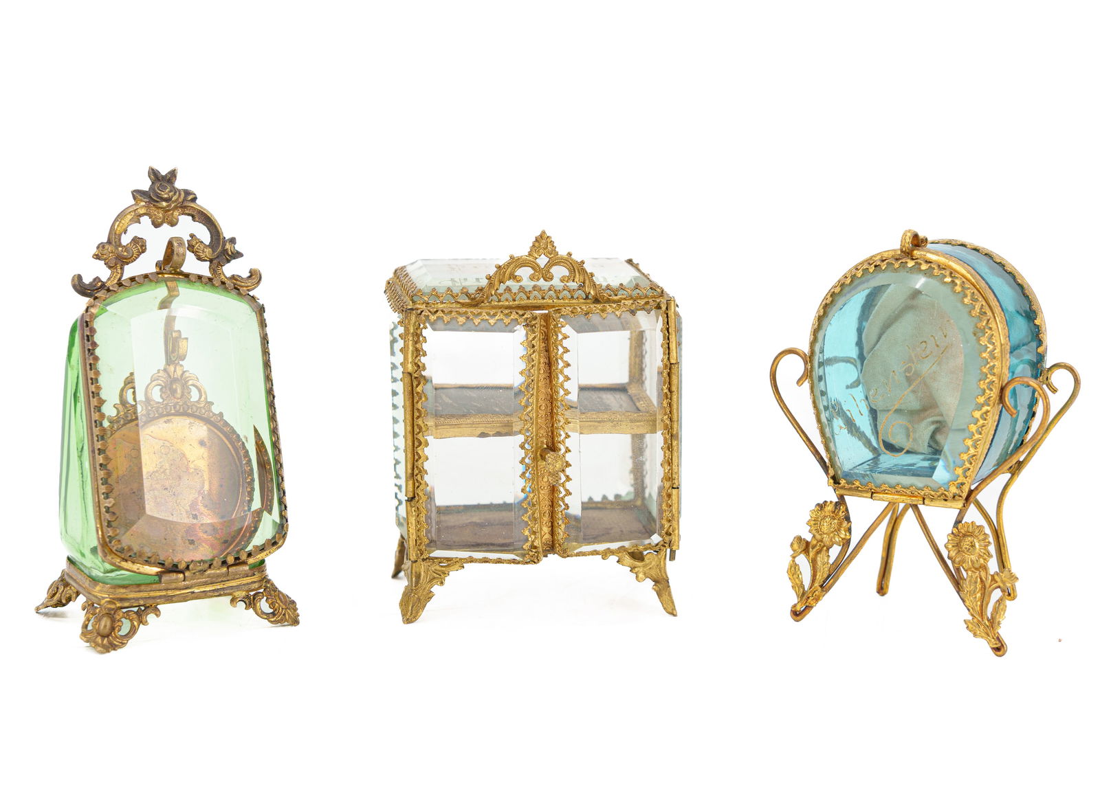 Jewelry box and pocket watch stand, around 1900: Jewelry box and pocket watch stand, around 1900Three artistically crafted boxes for storing pocket watches and jewelry. All three are made of partly colorful, faceted glass. The glass is set in gold-p