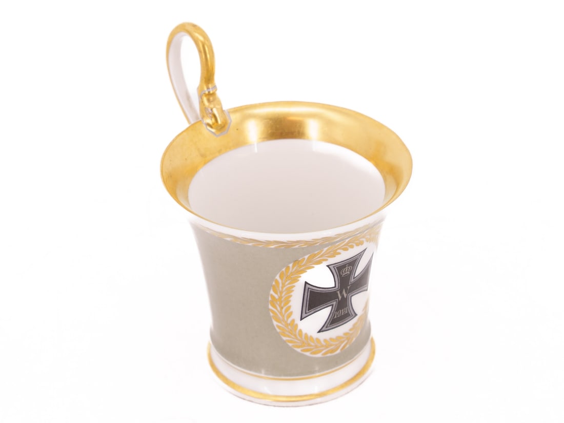Patriotic swan-handled cup, KPM, with Iron Cross 1914: Patriotic swan-handled cup, KPM, with Iron Cross 1914Patriotic swan-handled cup, Royal Porcelain Manufactory Berlin, with Iron Cross 1914. Bell-shaped porcelain cup, grey background, gold rim. On the