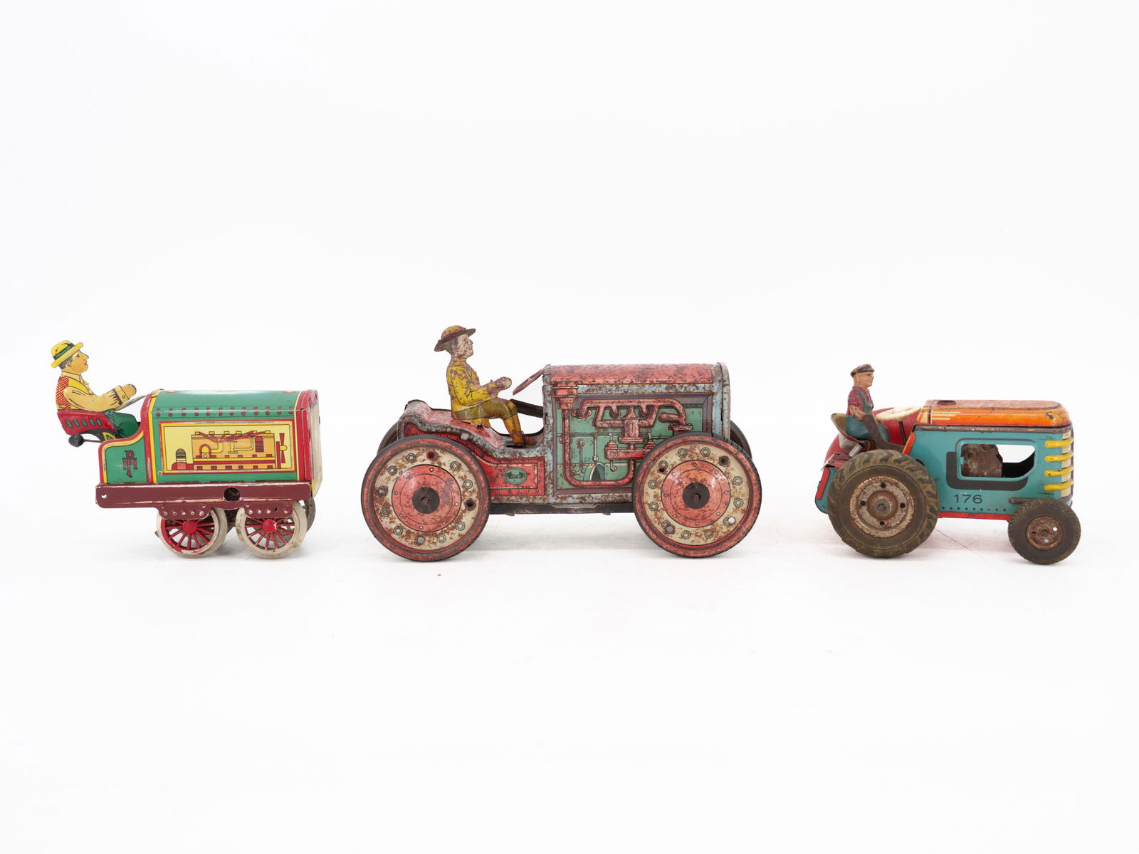 Set of three tin toys, tractors, manufacturers Gely, Dinky, Gama (1 of 3)