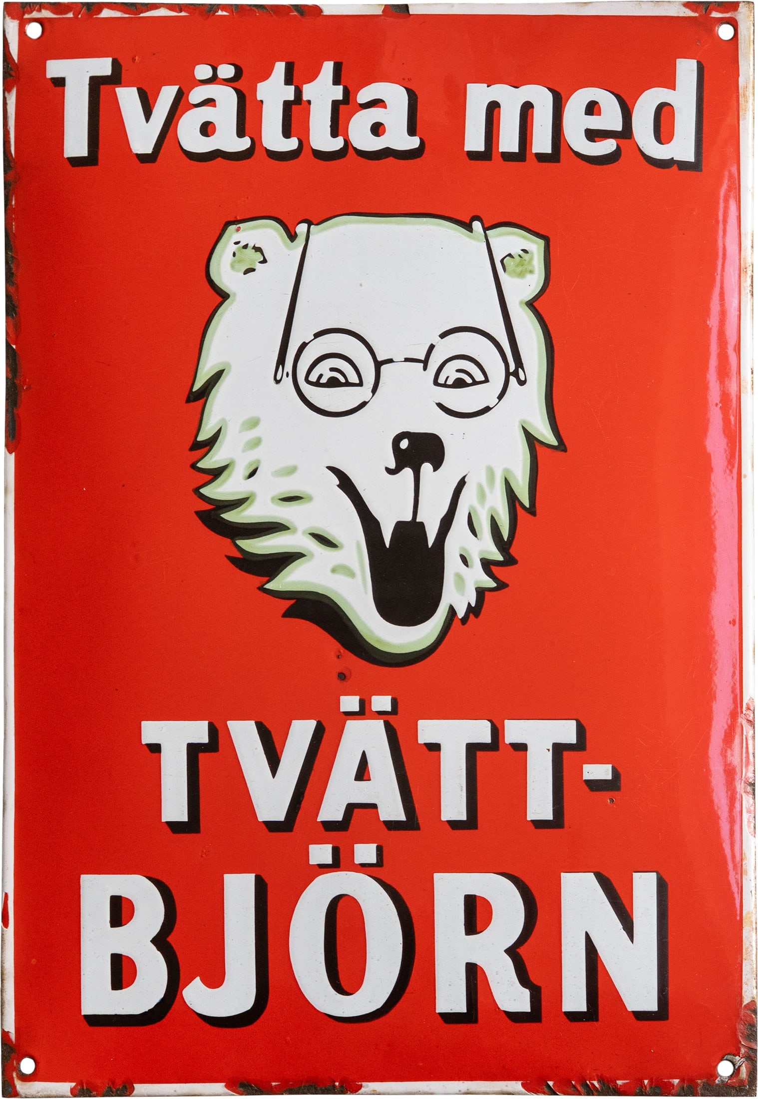 Enamel sign featuring Tvätt-Björn, washing powder, Sweden, circa 1930 (2+): Enamel sign featuring Tvätt-Björn, washing powder, Sweden, circa 1930 (2+)Tvätt-Björn enamel sign, domed. Enamel work applied in raised stencil. Excellent gloss and rich red colour, a few barely v