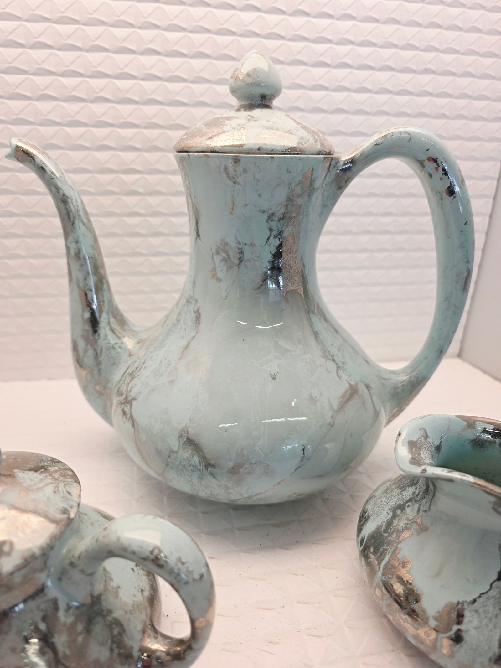 vintage Sascha Brastoff Surf Ballet coffee service: a vintage Sascha Brastoff Surf Ballet ceramic tea or coffee service in a turquoise and silver marbled pattern. Designer/Manufacturer: Sascha Brastoff, produced in the United States. Pattern: "Surf Bal