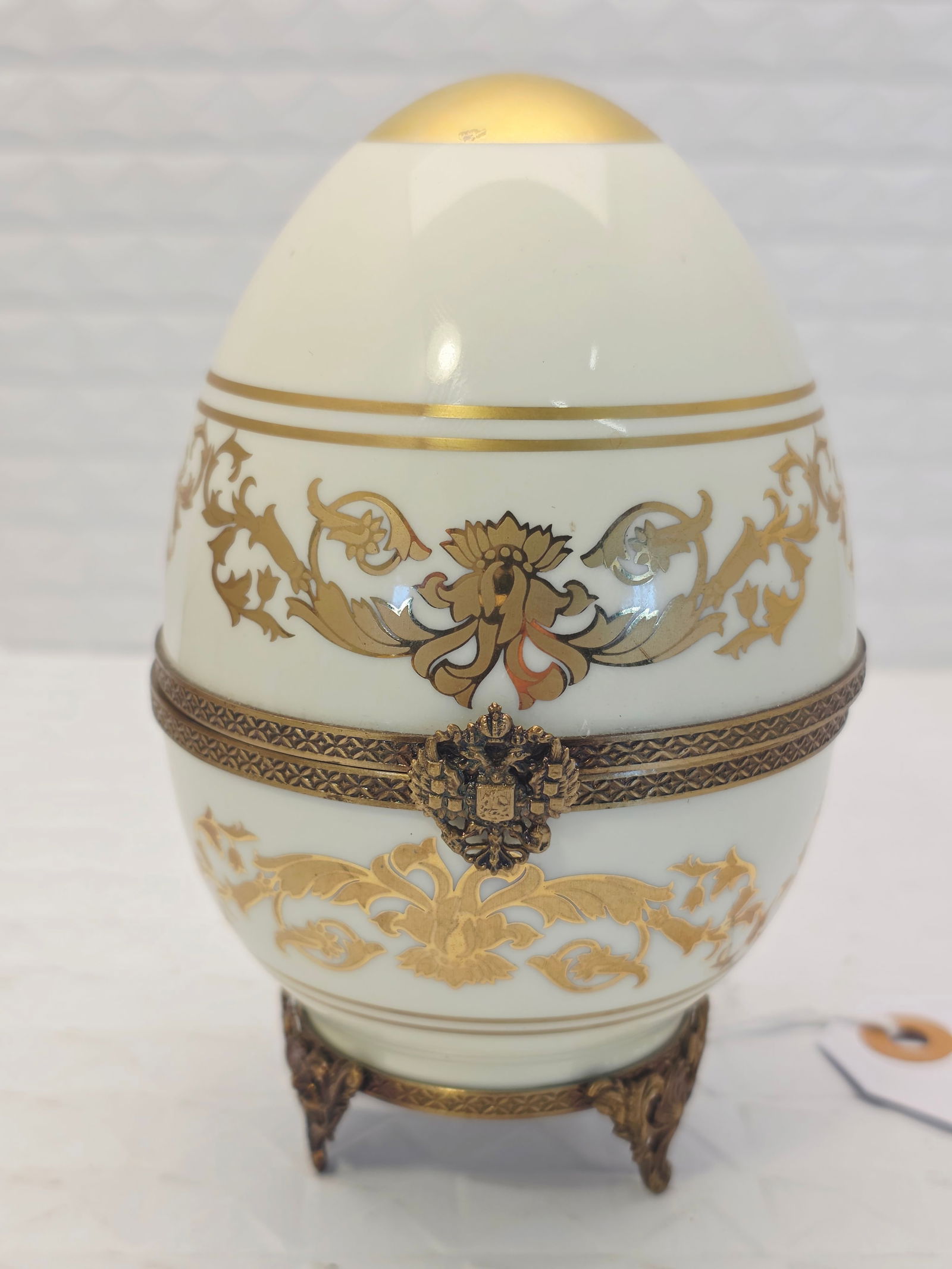 Original Faberge Egg Trinket Made under Faberge license by Limoges, marked 925: collectible porcelain egg-shaped trinket box, licensed by Russian Imperial Fabergé designs and manufactured in Limoges, France. hand-painted porcelain with detailed gold leaf accents and decorative S