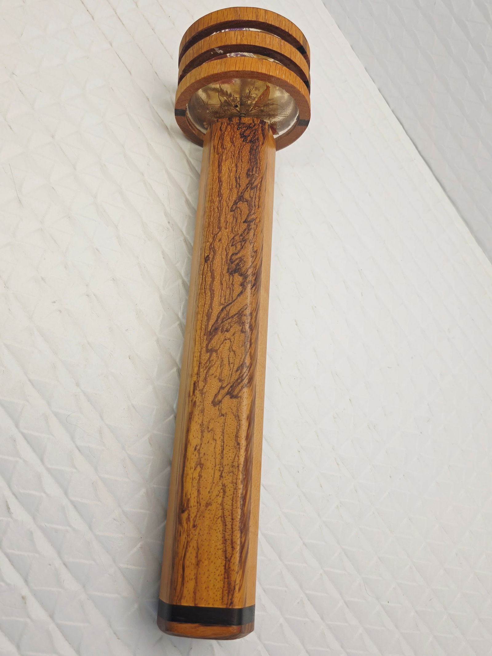 handcrafted wooden kaleidoscope: handcrafted wooden kaleidoscope, a vintage-style toy or decorative collectible. Material: Constructed from solid wood, likely oak, with walnut accents. Mechanism: Contains a 3-mirror system that creat