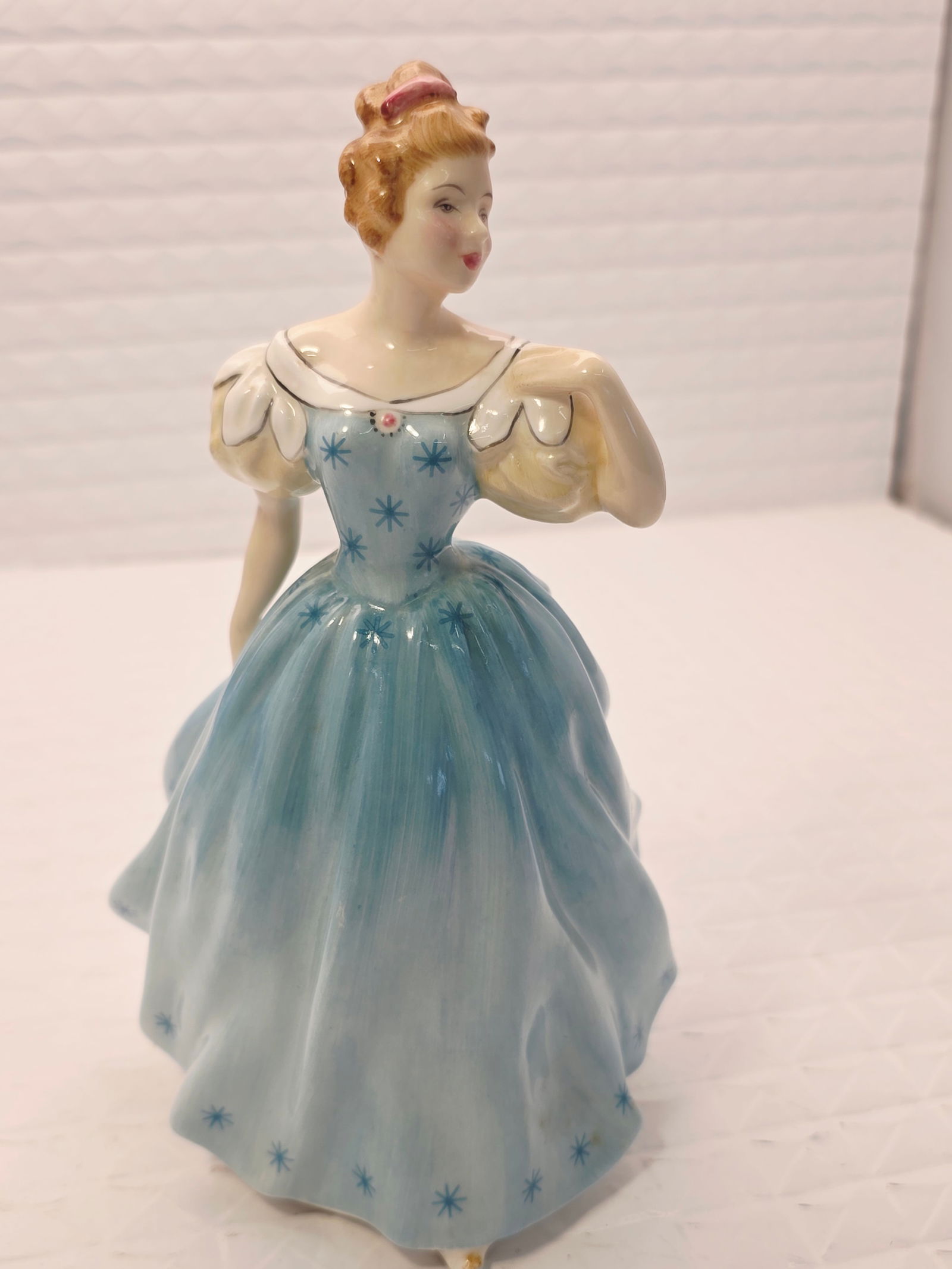 Royal Doulton Retired Figurine Enchantment HN2178: .Designer: Peggy Davies.Production Era: Issued between 1957 and 1982.Details: Hand-painted bone china made in England, typically featuring a woman in a blue gown. While we strive to note any damage, r