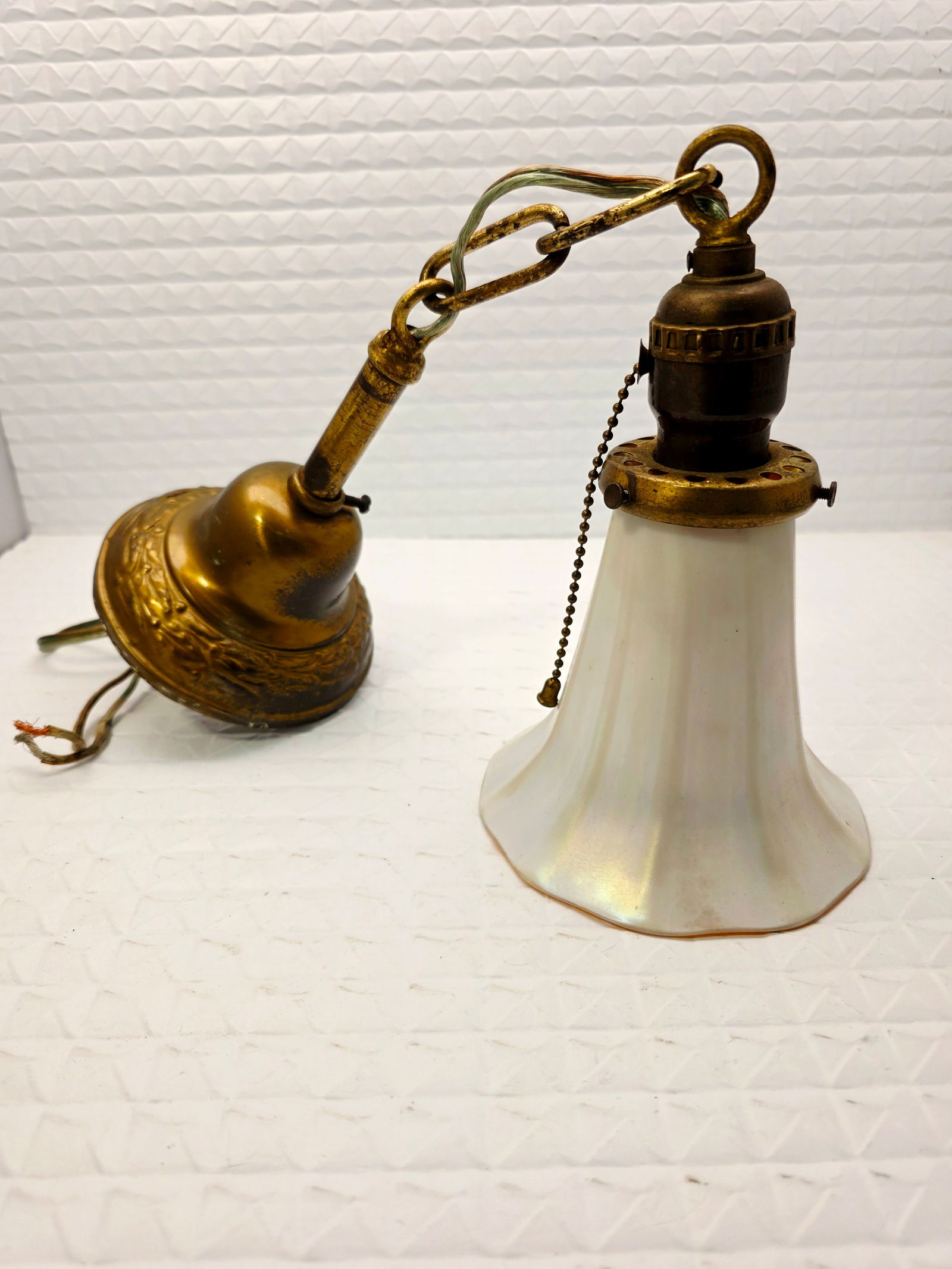 Steuben Gold Aurene Iridescent glass trumpet lamp shade, hanging light: vintage collectible Steuben Gold Aurene art glass trumpet lamp shade, brass hardware hanging light, featuring an iridescent gold finish and a fluted, floral form. Material: Iridescent Art Glas,