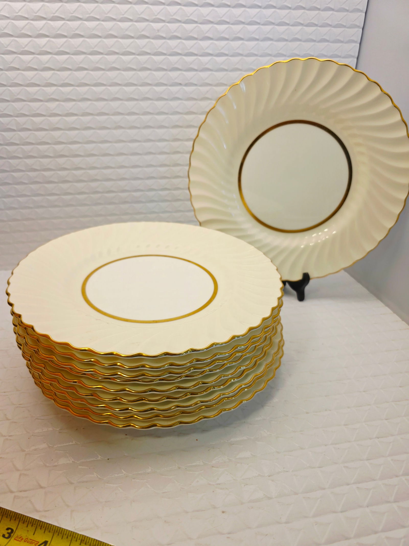 Minton Lady Devonish dinner plates, set of 10: Minton Lady Devonish dinner plates, set of 10. It is made of fine bone china and features a swirl design with a gold-rimmed edge. No issues, mint.While we strive to note any damage, repairs, or