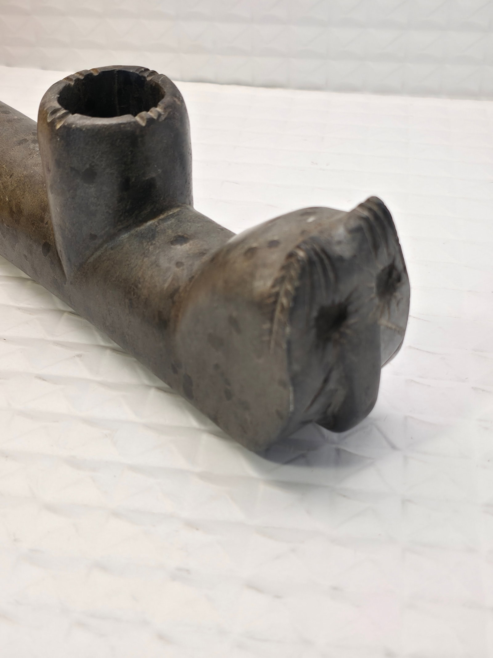 Steatite Stone effigy pipe, likely 19th to early 20th century: stone effigy pipe, a style of smoking pipe crafted by various Native American cultures to represent animals, birds, or human figures. The material is likely steatite (also known as soapstone or "black