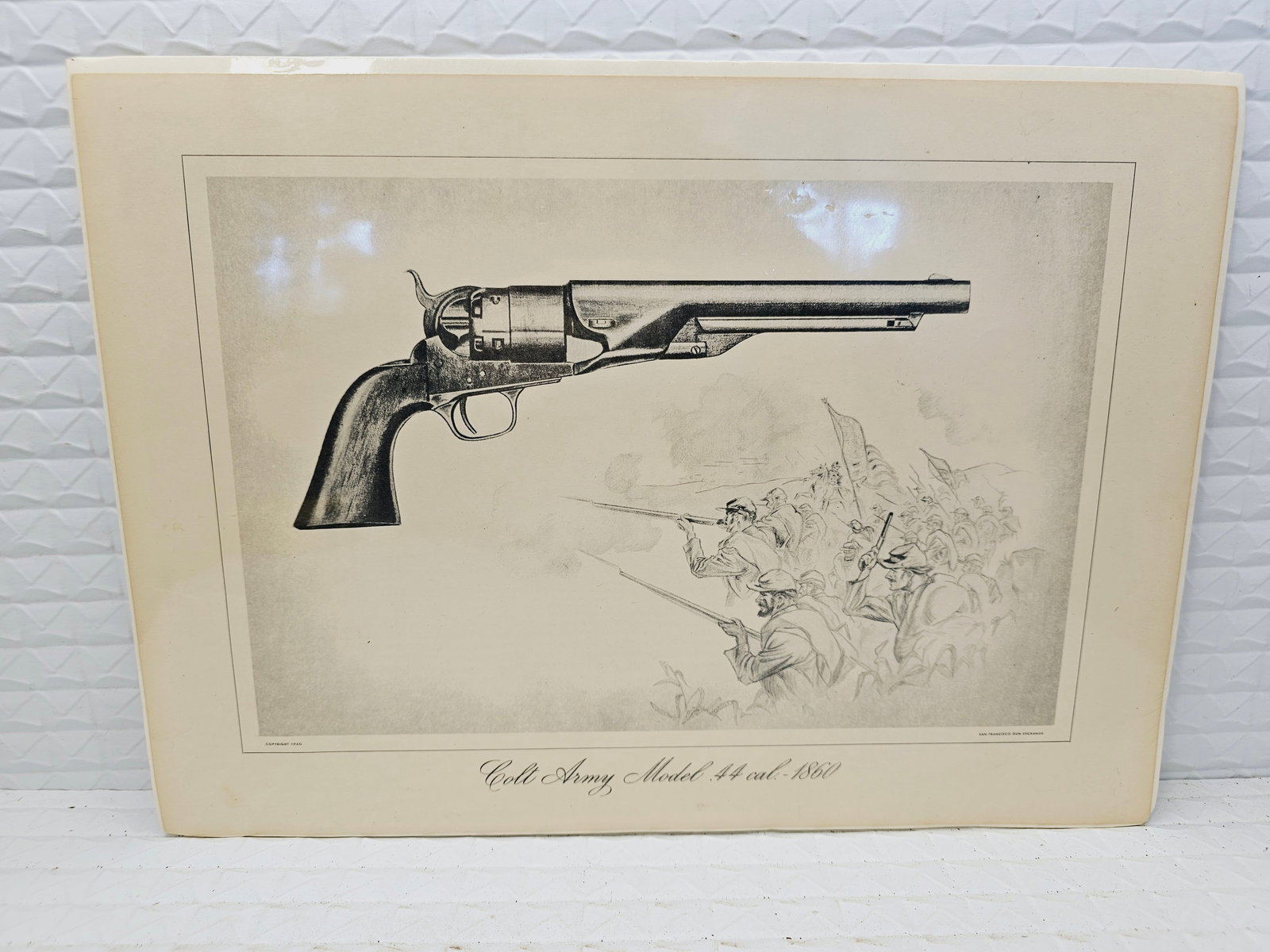 vintage print of the Colt Army Model 1860 .44 caliber revolver: vintage print of the Colt Army Model 1860 .44 caliber revolver.Content: The illustration shows the .44 caliber revolver used extensively during the Civil War, positioned above a scene of soldiers in b