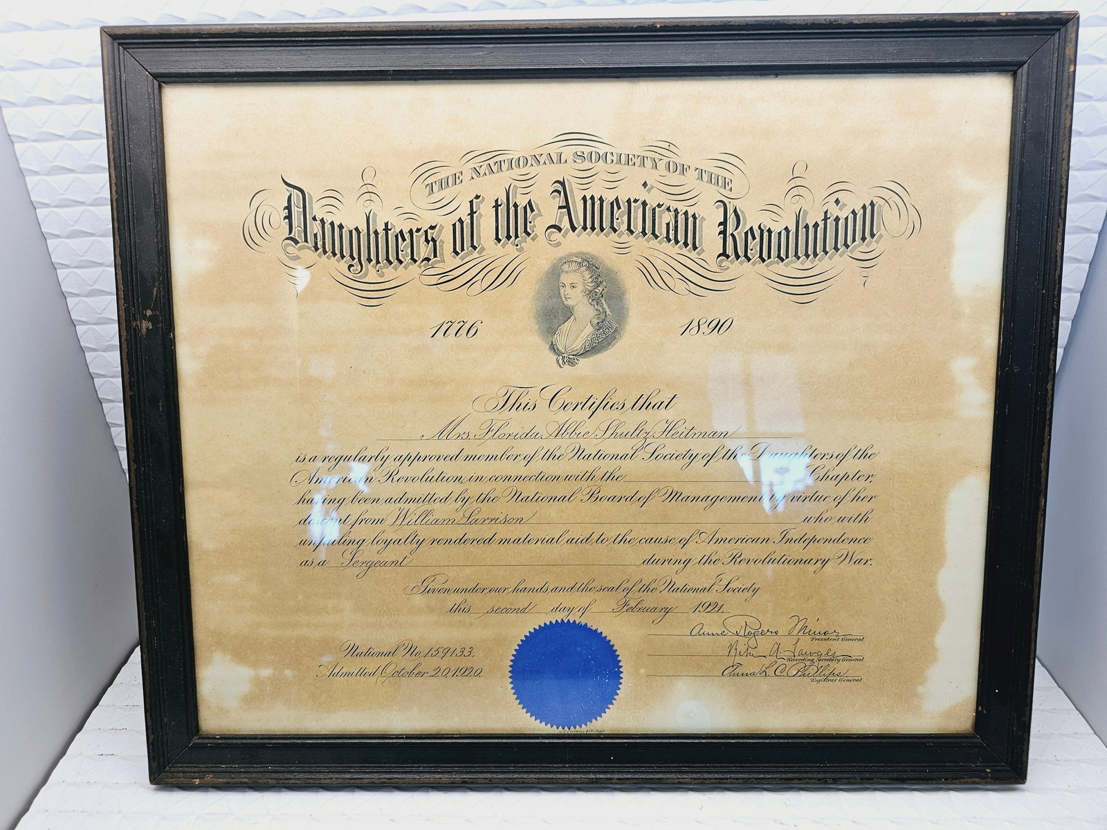 Framed Daughters of the American Revolution (DAR) membership certificate: framed Daughters of the American Revolution (DAR) membership certificate was issued in 1921 to Mrs. Florida Abbie Shultz Heitsman, based on her descent from patriot William Garrison.Historical Signifi
