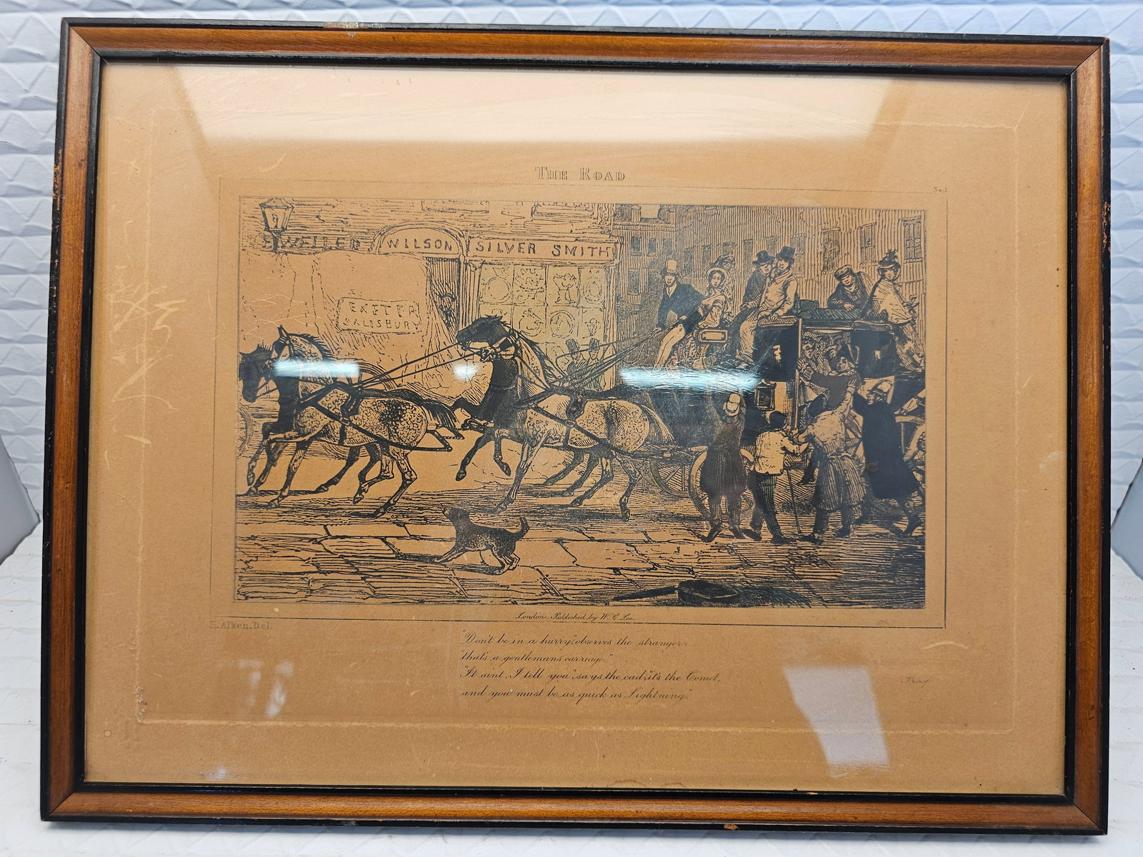This is an antique engraving titled "The Road" by British sporting artist Henry Thomas Alken: This is an antique engraving titled "The Road" by British sporting artist Henry Thomas Alken.The print depicts a bustling 19th-century coaching scene featuring horse-drawn carriages.Similar original e
