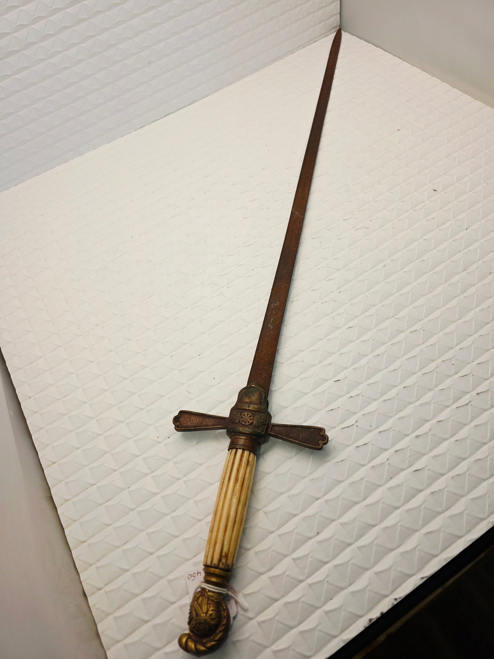 US Militia non commisioned officer sword Civil War era: One of the many variants (see Peterson #11 and #12) which were purchased by state militias before, during and after the Civil War. Brass hilt with cruciform guard and shield form langets. Plumed helme