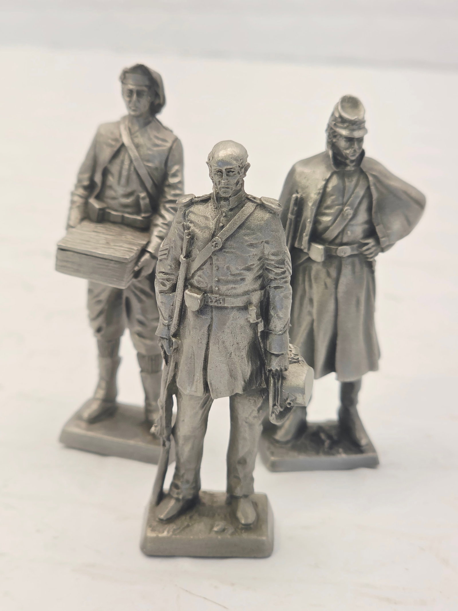 Vintage Franklin Mint Pewter Soldiers from Civil War era: vintage Franklin Mint pewter soldiers from the American Military Sculpture Collection, produced between roughly 1977 and 1983. The set features detailed miniatures representing various eras of America