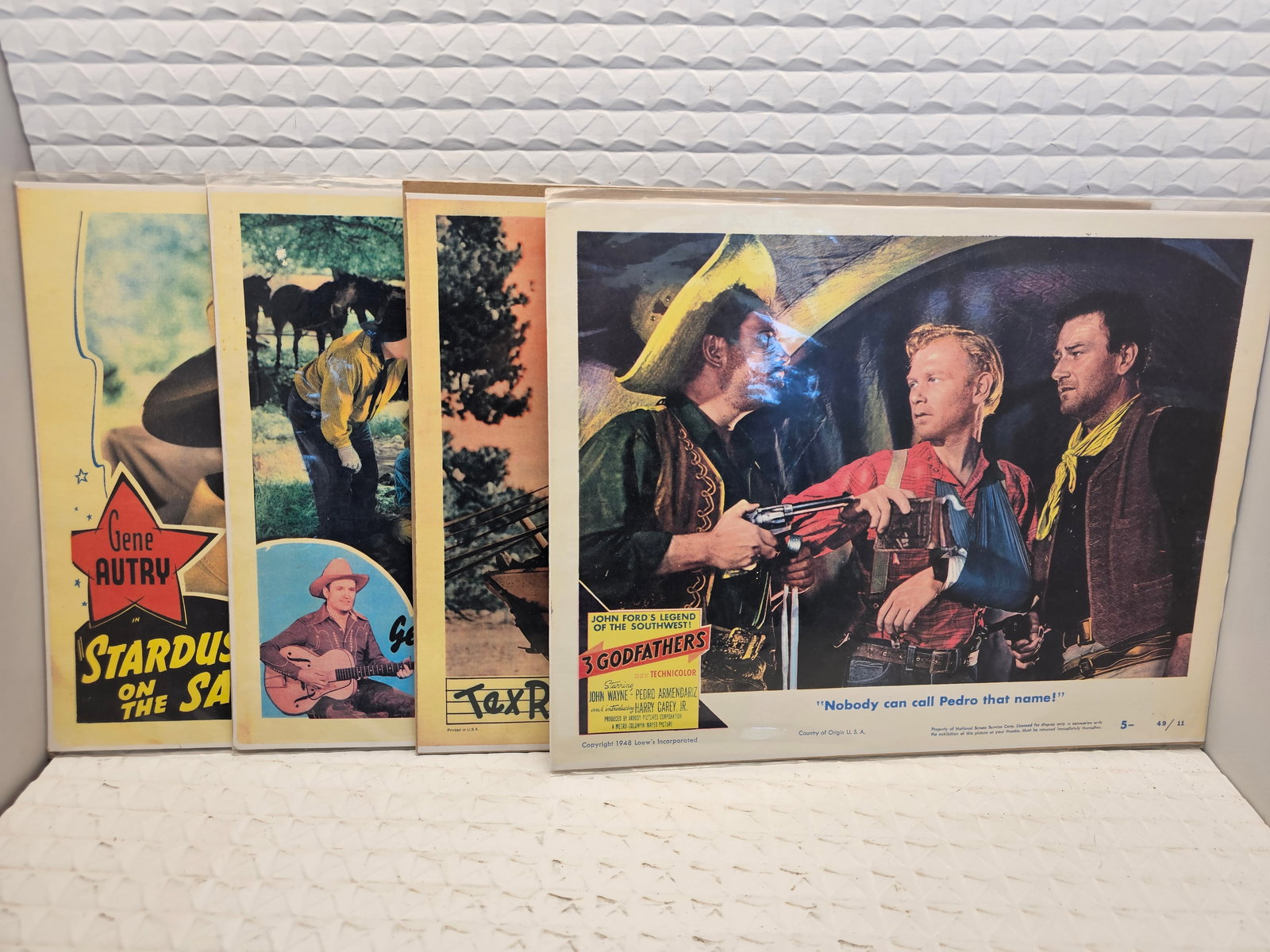 lobby cards (reproductions) from westerns in the 40s (1 of 11)