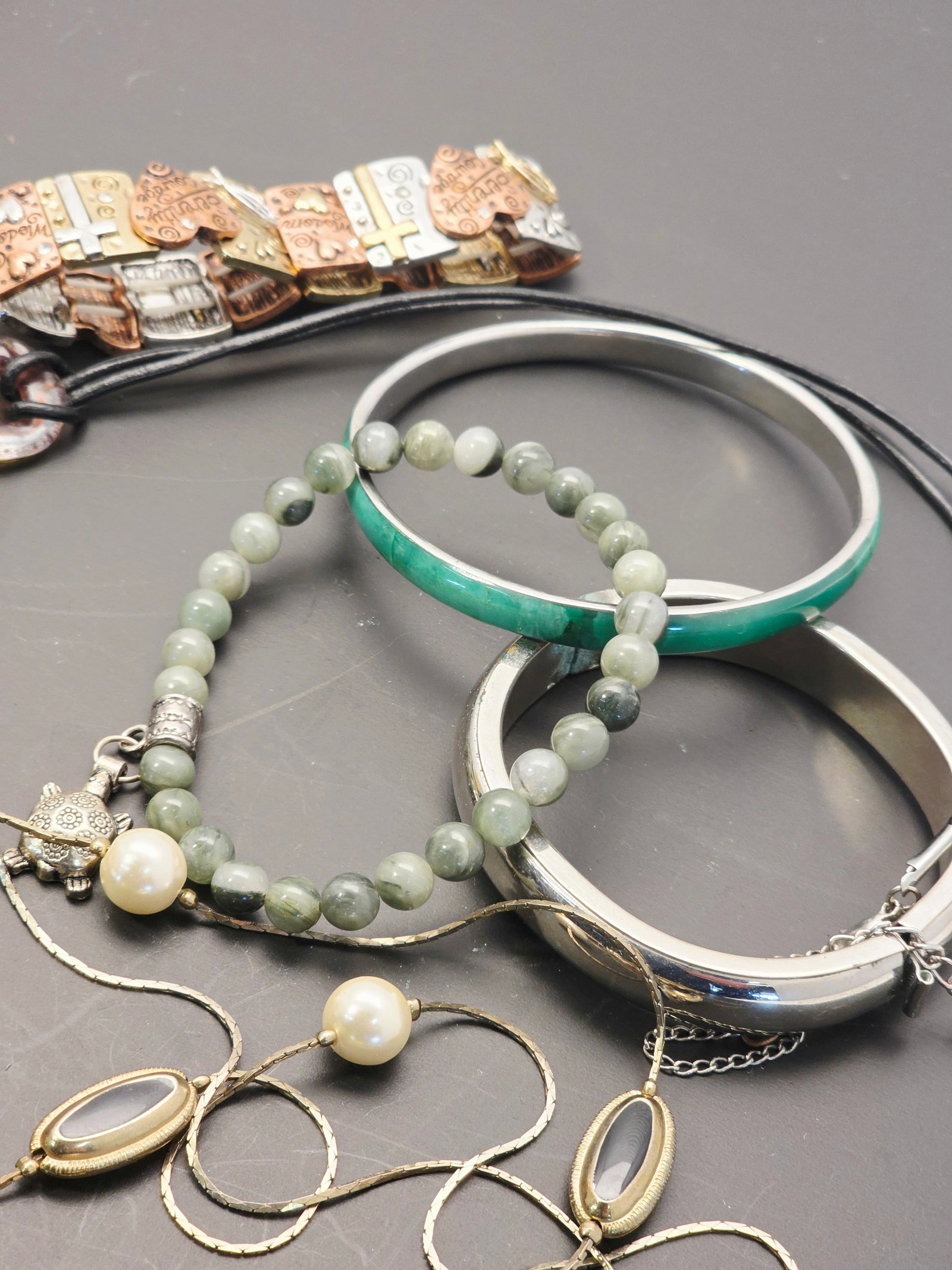 assorted costume jewelry items - 7