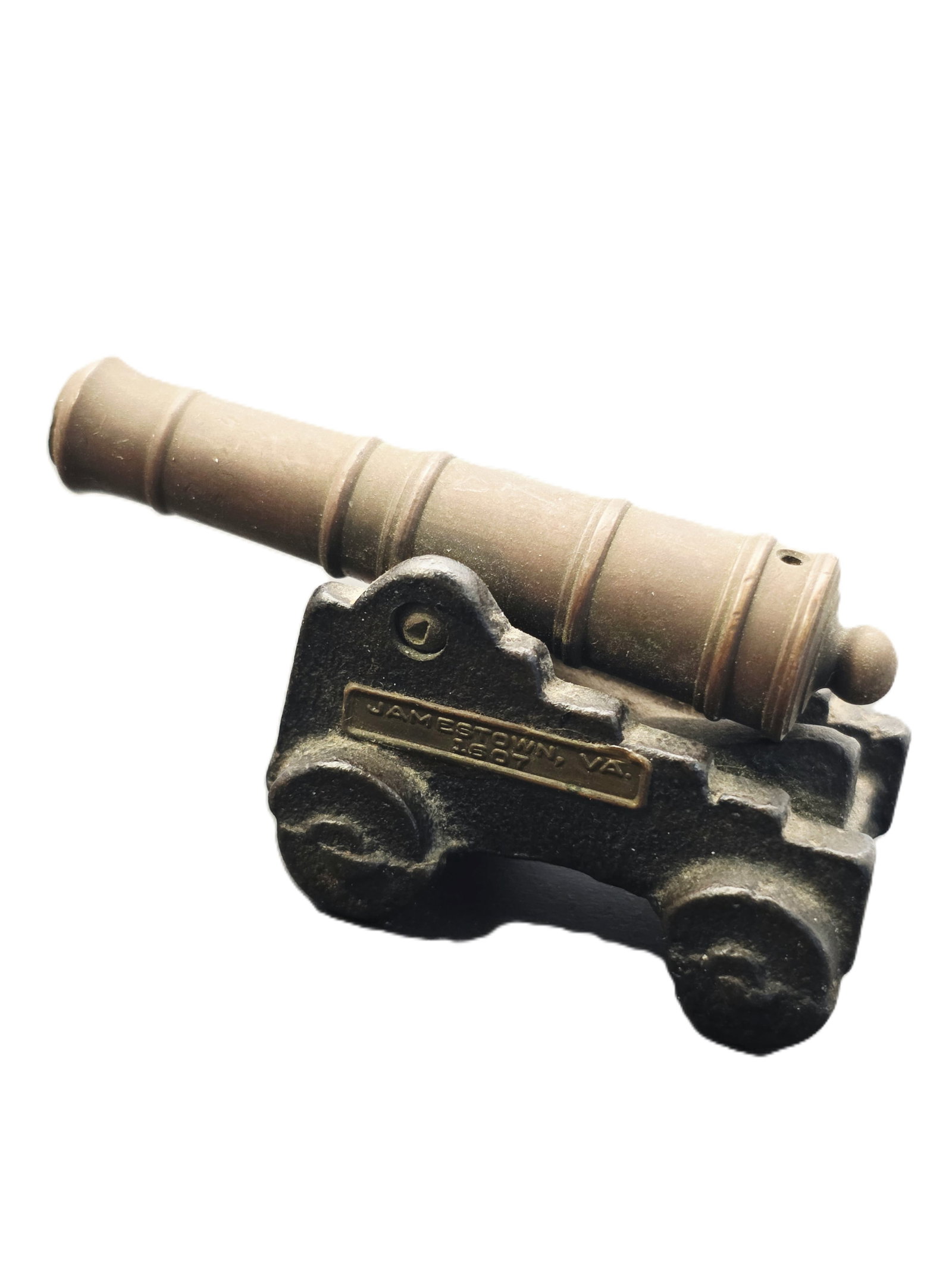 vintage miniature cast iron and brass cannon model: vintage miniature cast iron and brass cannon model, often featuring decorative details like "Jamestown, VA" on the carriage