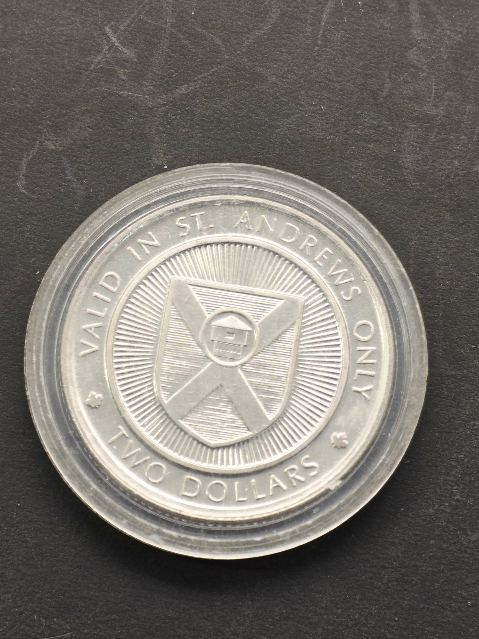 Municipal trade dollar from St. Andrews: municipal trade dollar from St. Andrews, New Brunswick, Canada, likely issued in 1979.Token Type: This is a local municipal trade dollar, not legal tender for national currency.Validity: The