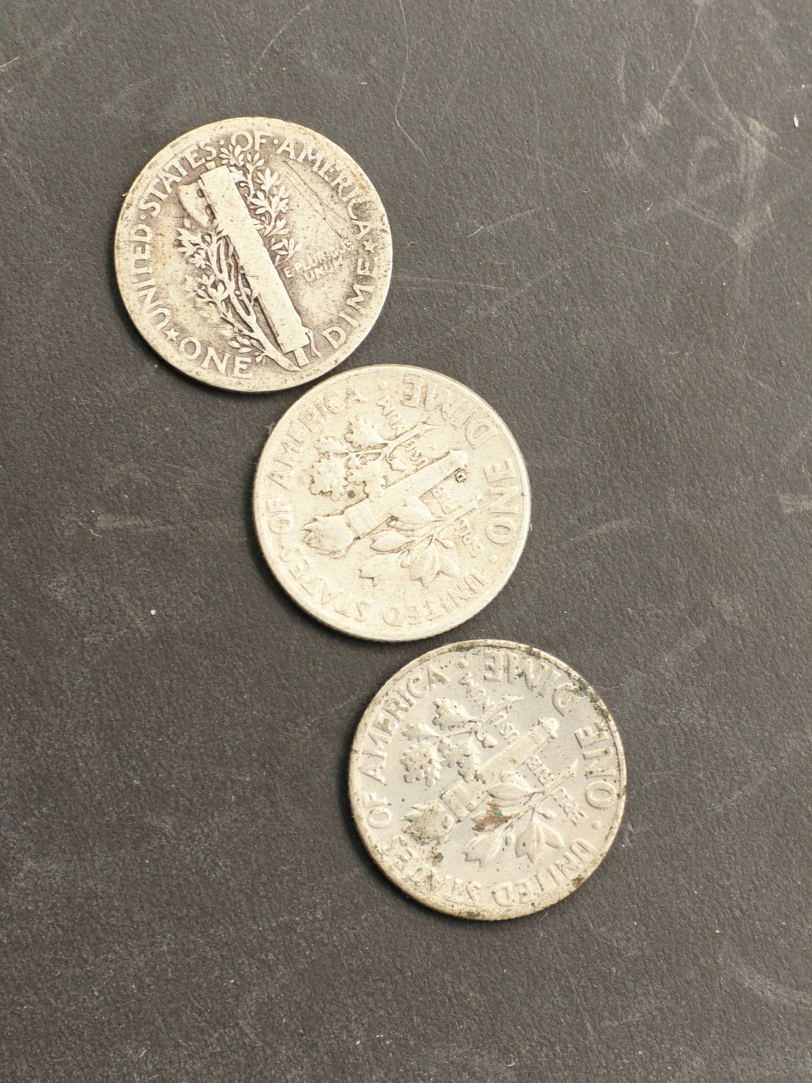 1923 to 1943 Mercury and Roosevelt dimes, 90% silver: Old silver dimes1923 United States Mercury Dime.This coin features a "Winged Liberty Head" design created by Adolph Weinman.It is composed of 90% silver and 10% copper, with a total weight of 2.5