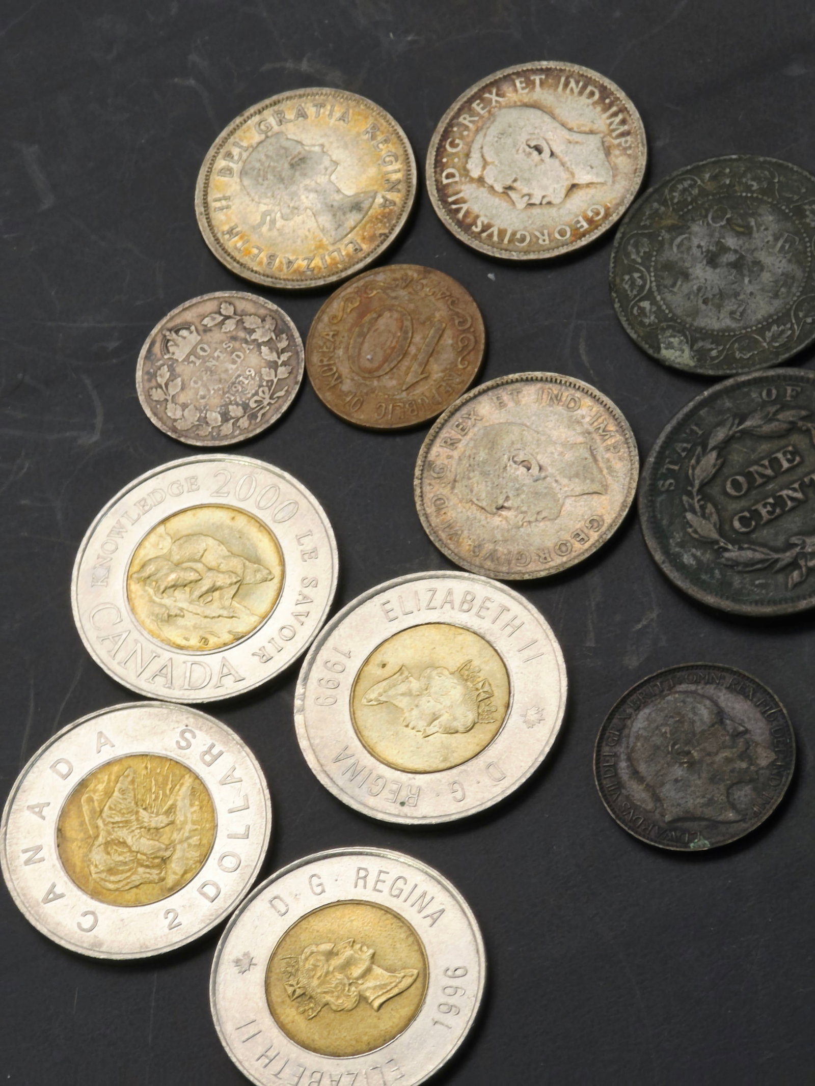 collection of highly valuable coins, early 1800s US 1 cent and silver Canadian quarters (1 of 6)