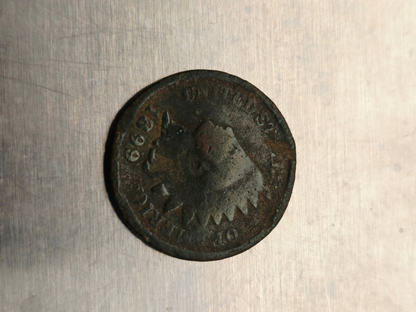 1899 Indian Head coin (1 of 7)