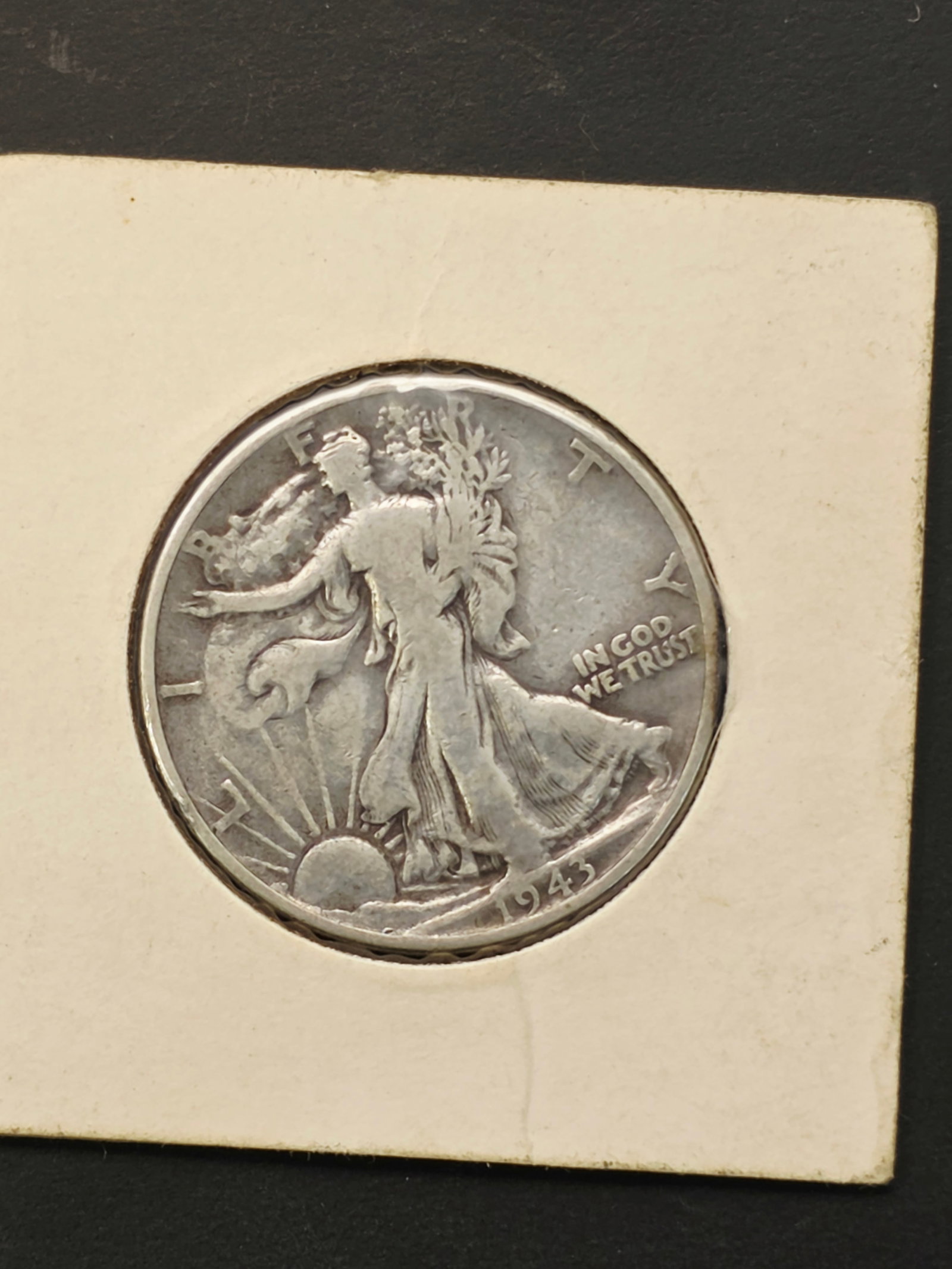 1943 Walking Liberty half dollar: 1943 Walking Liberty half dollar.Composition: These coins are struck in 90% silver and 10% copper.Design: Designed by Adolph A. Weinman, the obverse features Liberty striding toward the dawn, while