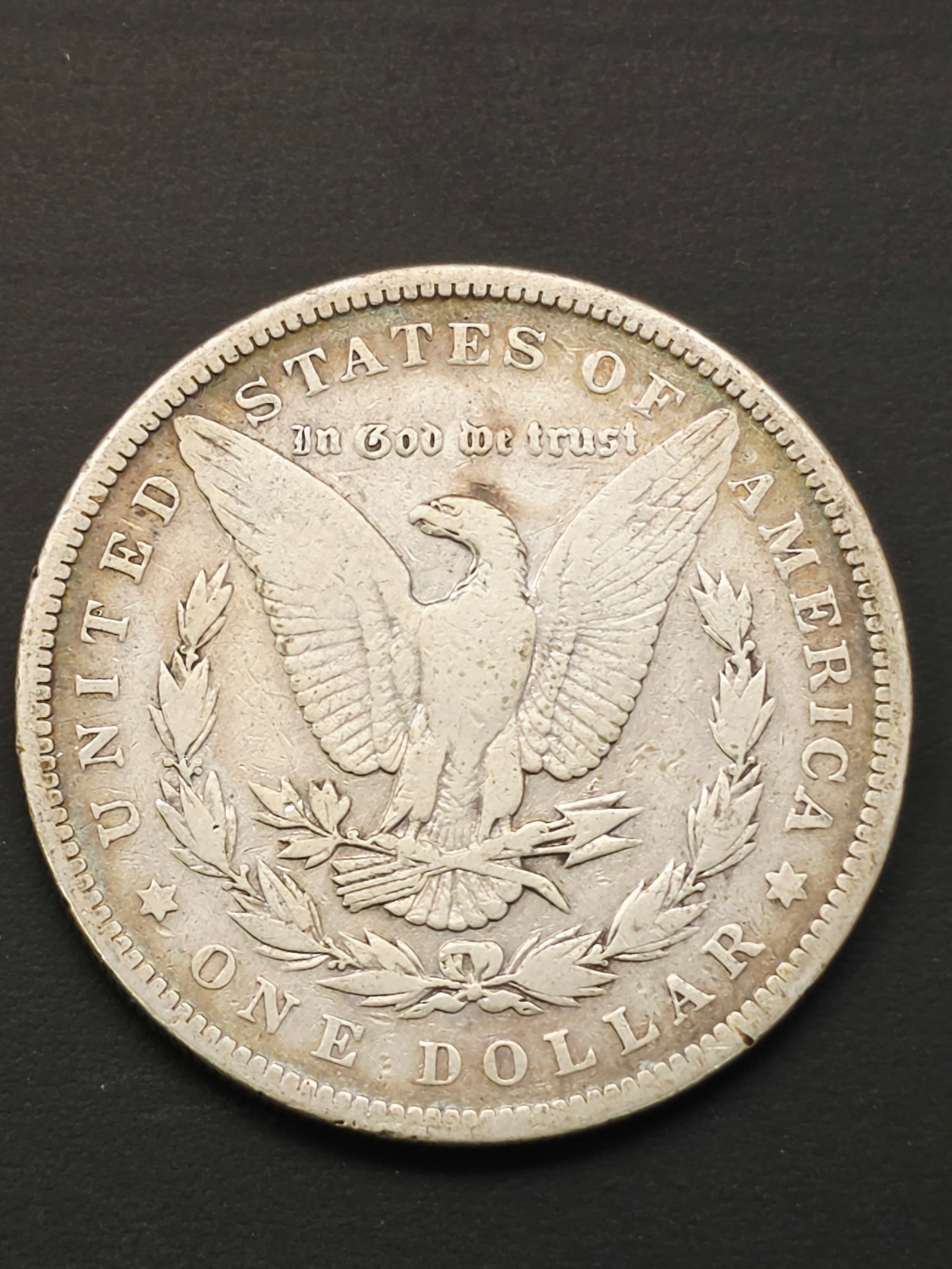 good condition 1891 Morgan Silver Dollar, no mint mark: 1891 Morgan Silver Dollar, a coin minted in the United States composed of 90% silver. Its value depends heavily on its condition, rarity, and the mint mark, which can be found on the reverse side.Esti