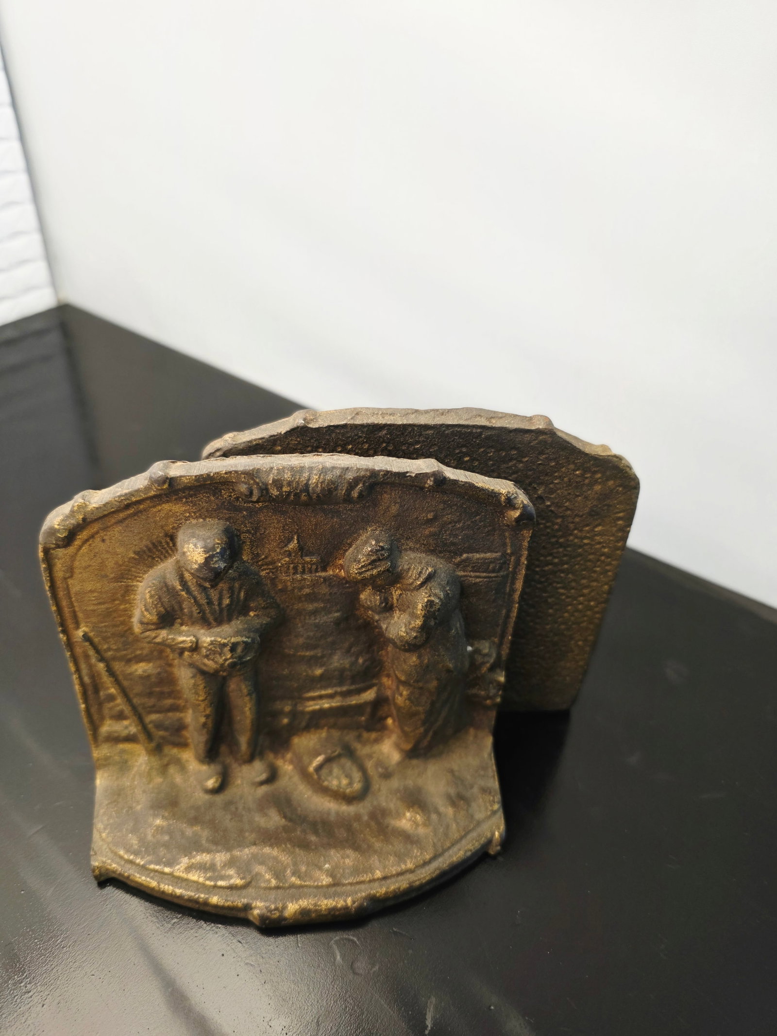 early 20th-century American high-relief cast iron bookends featuring "The Angelus" by J.F. (1 of 8)