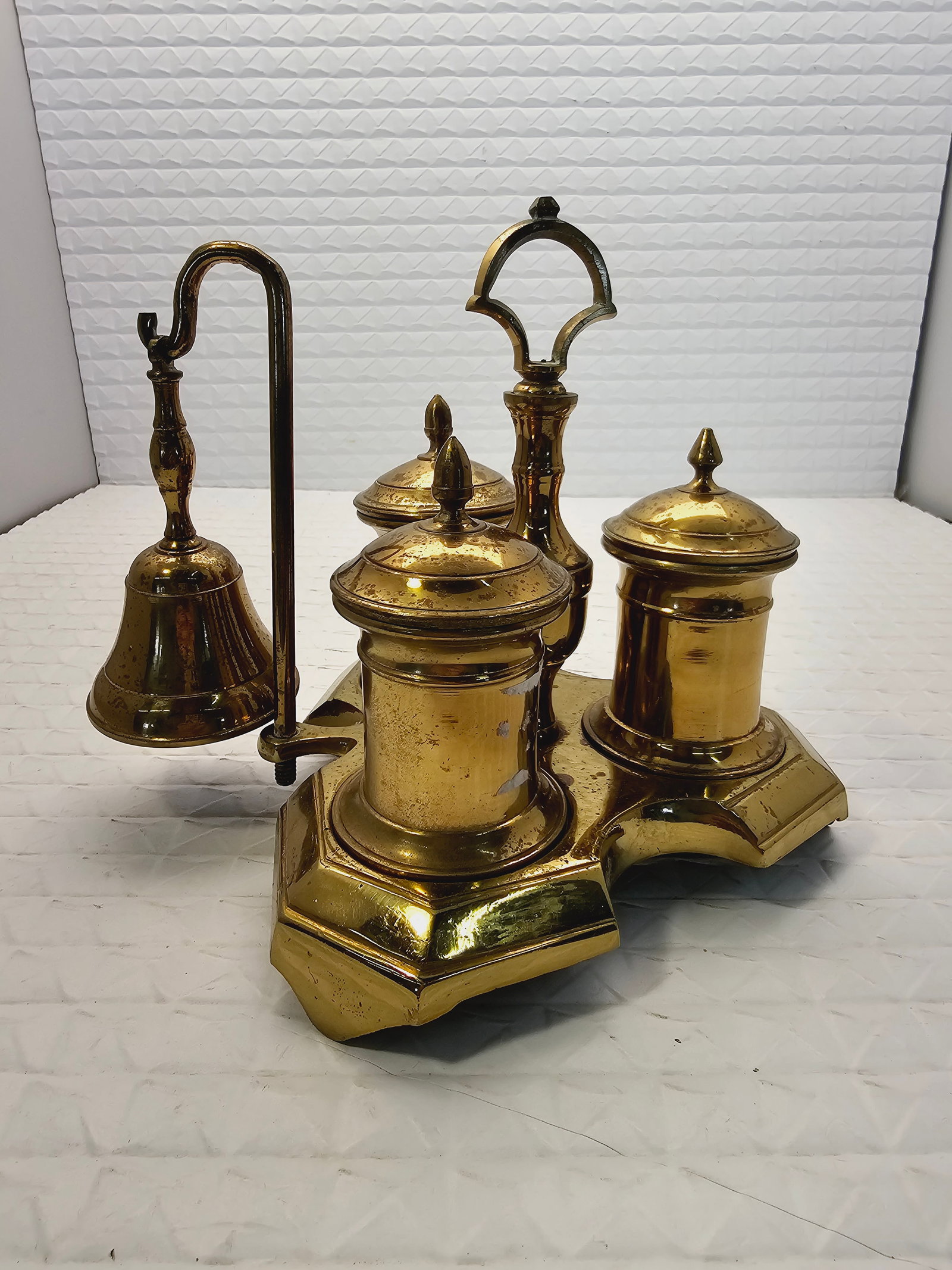 Amazing antique Spanish or English brass standish: antique Spanish or English brass standish, or desk inkstand, likely dating from the late 18th to early 19th century.Components: These sets typically feature a shaped base with various lidded