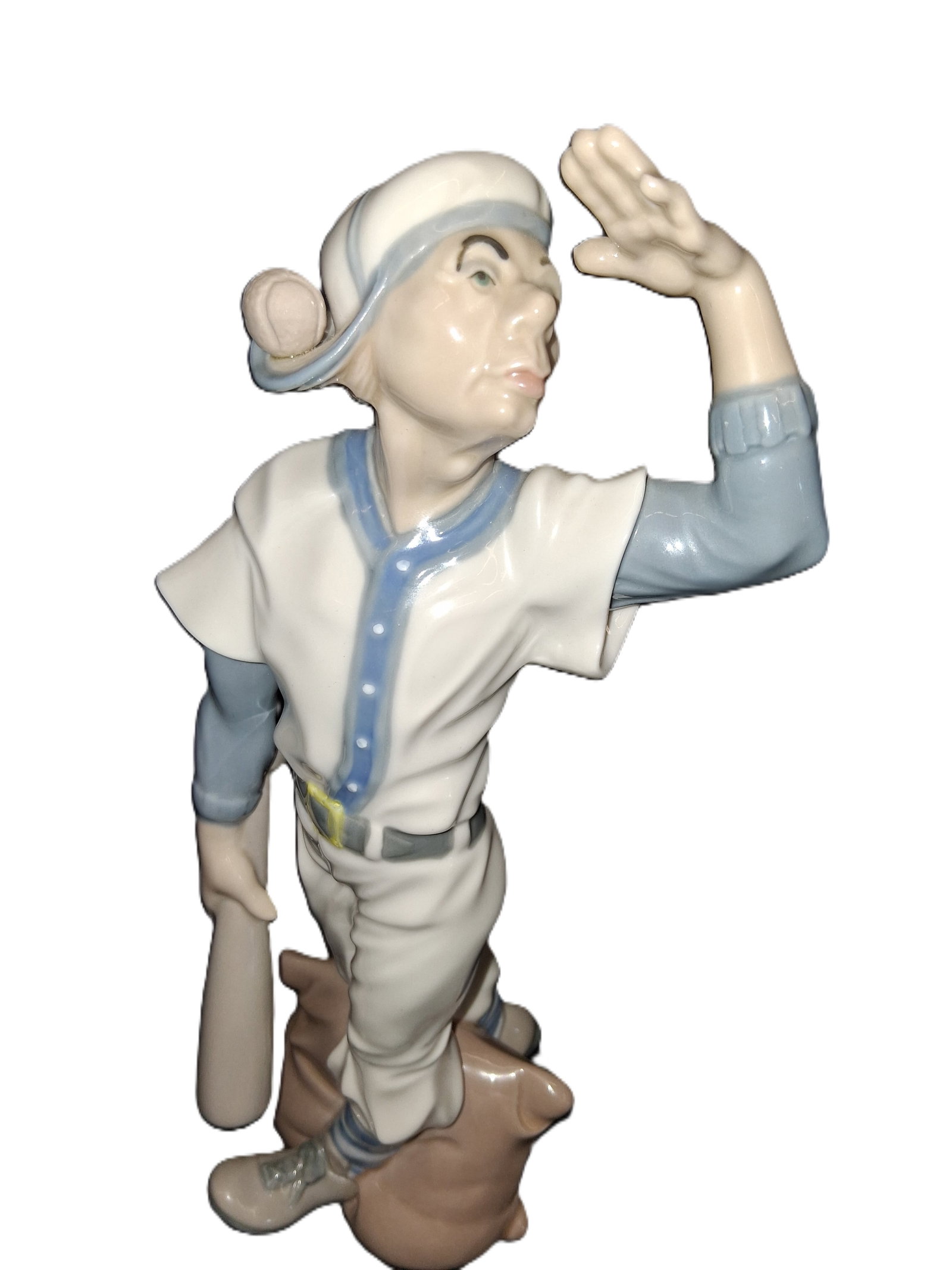 Casades Spain porcelain figurine: rare Casades Spain porcelain figurine titled "Baseball Boy," featuring a glossy finish and a boy holding a bat.