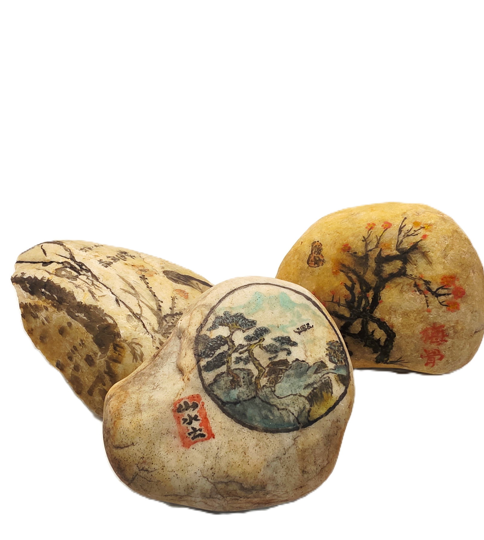Traditional Shanshui Painted River Stones: stones are hand-painted river stones featuring traditional Chinese landscape art, often referred to as Shanshui (mountain-water) painting. This art form uses the natural shape, color, and texture of t