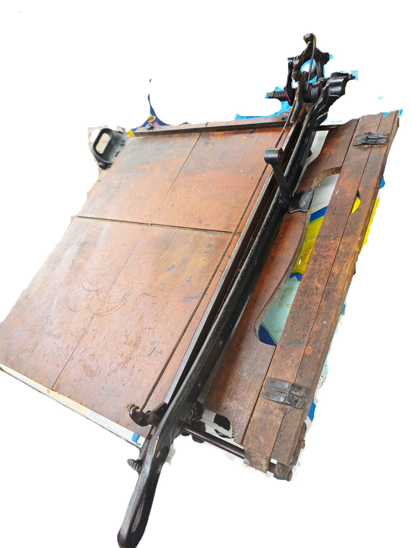 Giant Antique Paper cutter, amazing find: Antique heavy duty paper cutter or board shear, a tool often featuring a wooden base and a cast iron cutting mechanism.Potential Manufacturers: Similar items were produced by companies such as Milton 