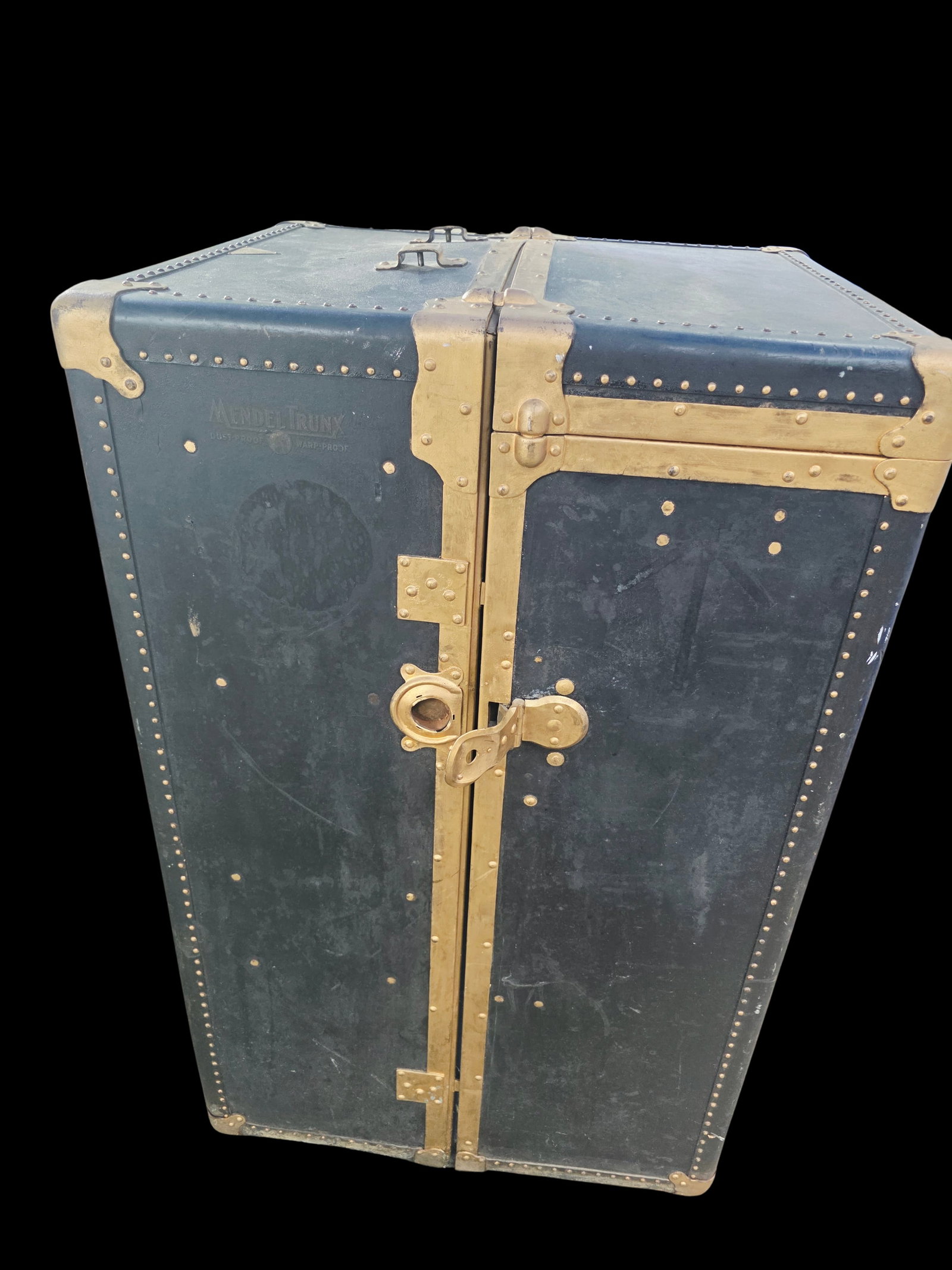 Antique Mendel-Trunx wardrobe-style steamer trunk: gorgeous spacious steamer trunk that can be used as a dresser or decor in a store. Features drawers and brass decor. Minor rust on the bottom metal parts.