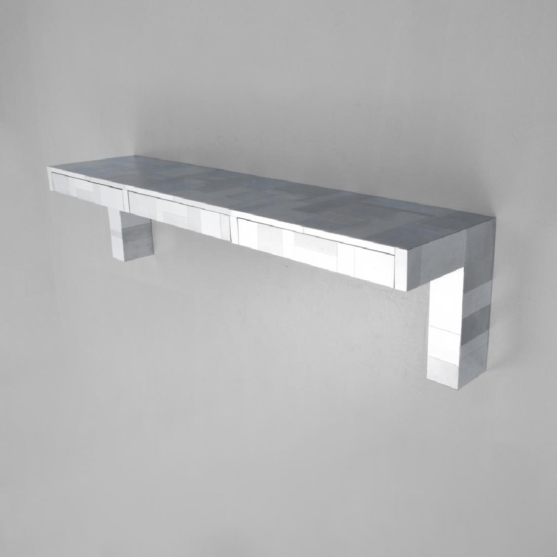 Large Paul Evans Wall - Mounted CITYSCAPE Console: Designer (Artist), Manufacture: Paul Evans; Paul Evans Studio for Directional Markings: inscribed An Original Paul Evans Country of Origin, Materials: USA; chromed metal Additional Information: Consol