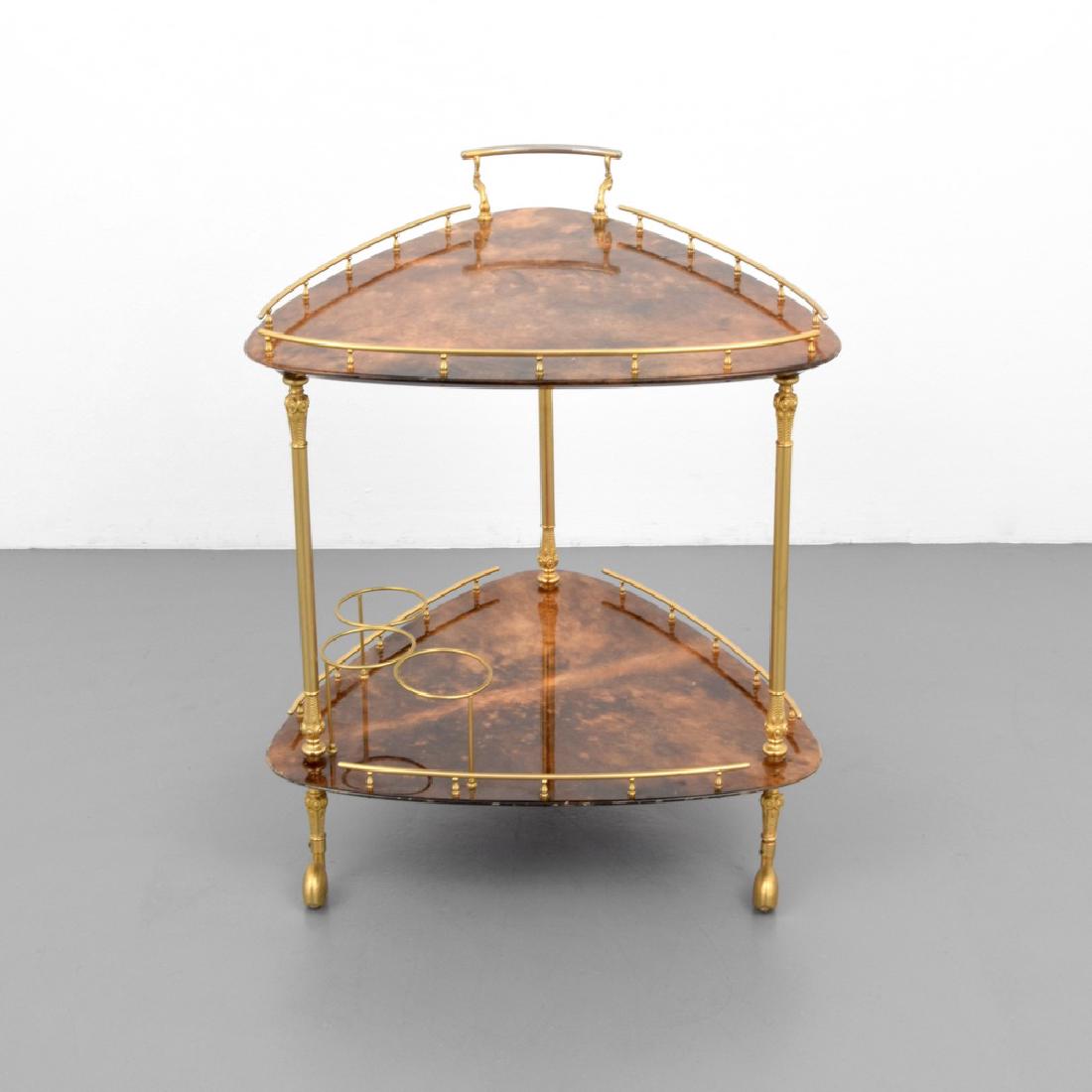 Aldo Tura Goat Skin Bar Cart: Designer (Artist), Manufacture: Aldo Tura Markings: Creazione Tura label Country of Origin, Materials: Italy; lacquered goatskin, brass Additional Information: Wheeled two-tiered bar cart with bottle