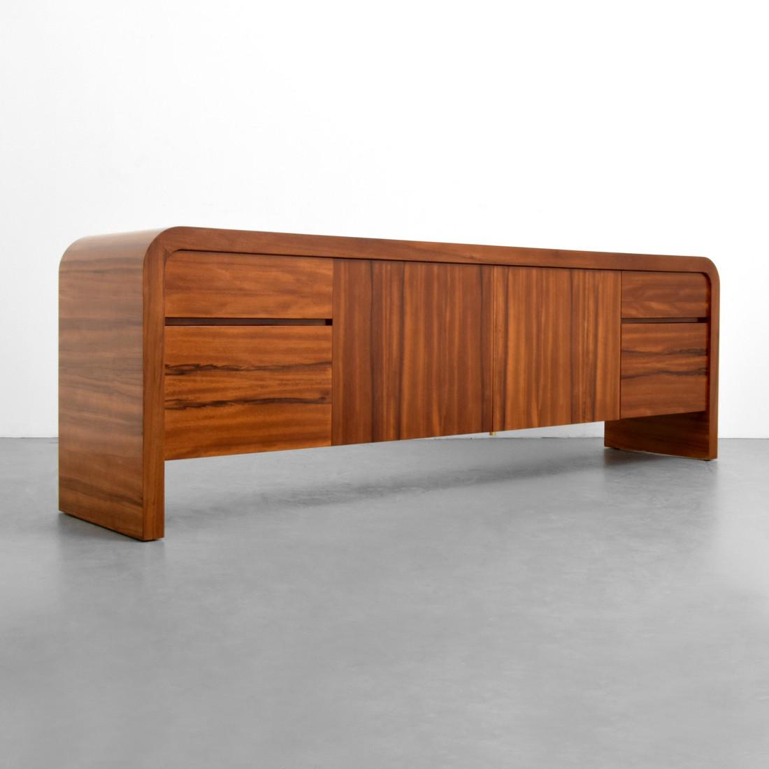 Large Vladimir Kagan Rosewood Cabinet: Designer & Manufacturer: Vladimir Kagan; Vladimir Kagan Designs Markings: Vladimir Kagan label Country of Origin & Materials: USA; rosewood, metal Additional Information: Cabinet has four drawers, two