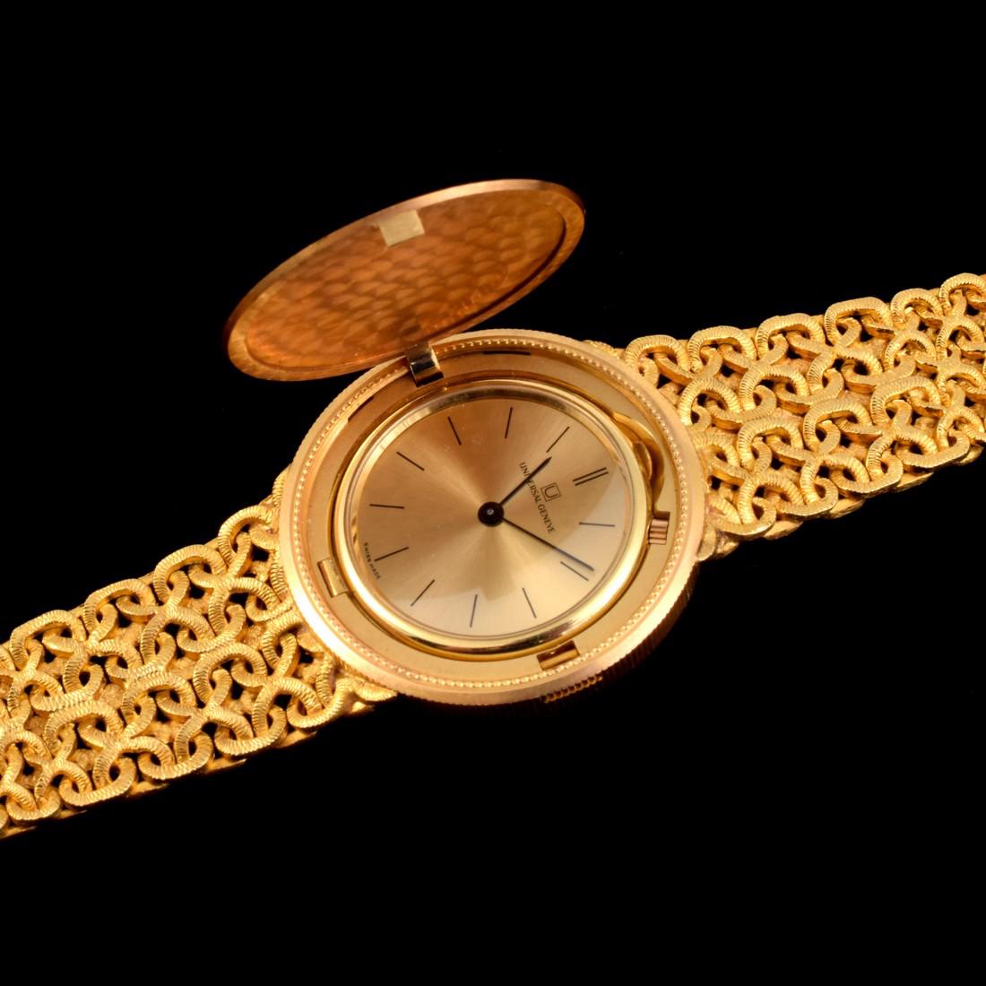 18K Yellow Gold Universal Geneve Vintage Estate Watch: Designer & Manufacturer: Universal Geneve Markings: marking(s) Country of Origin & Materials: Italy (bracelet) Additional Information: 18K yellow gold watch has a 1901 ten dollar American coin on a ta